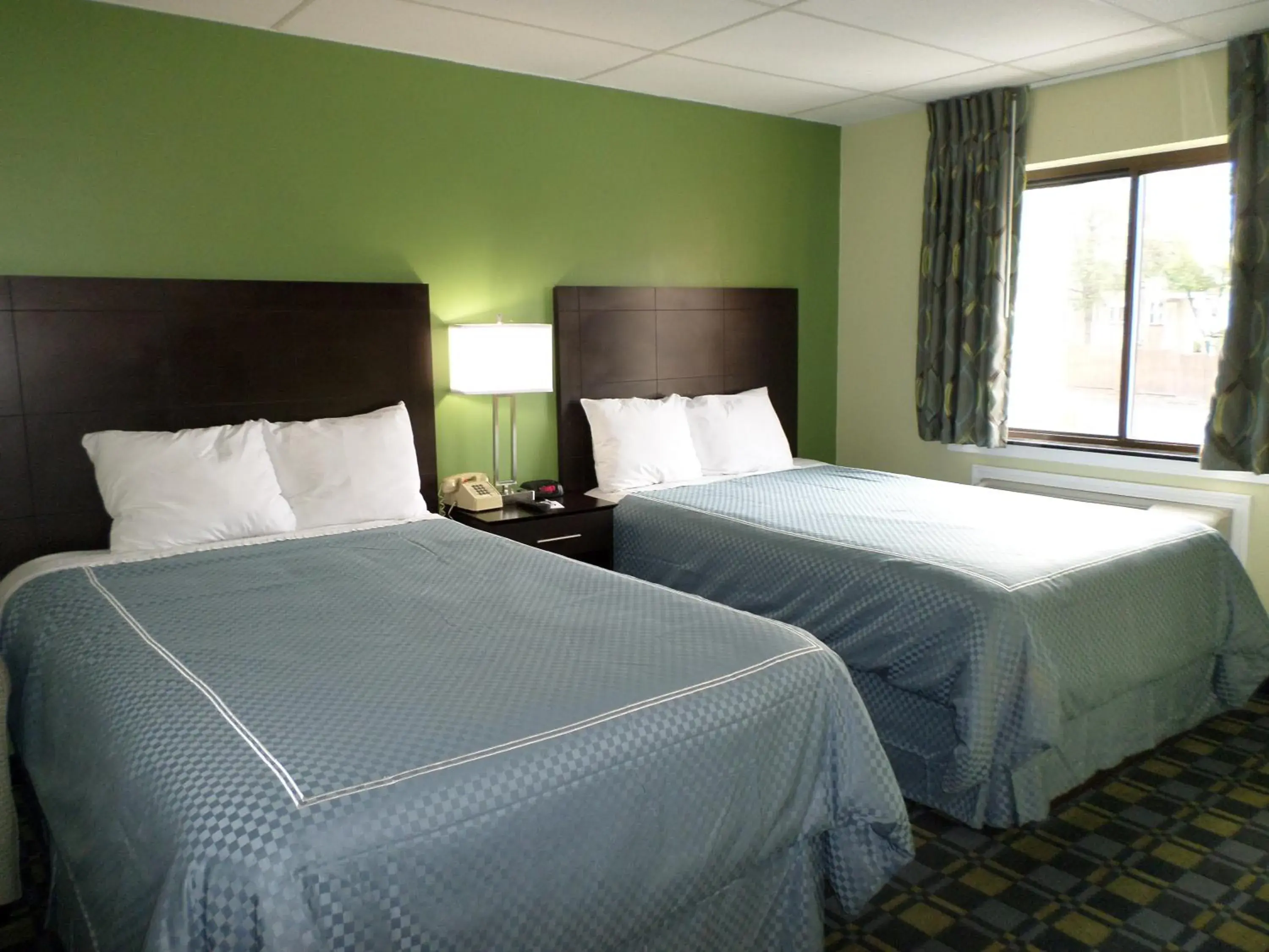 Bed in Travelodge by Wyndham Cleveland Lakewood