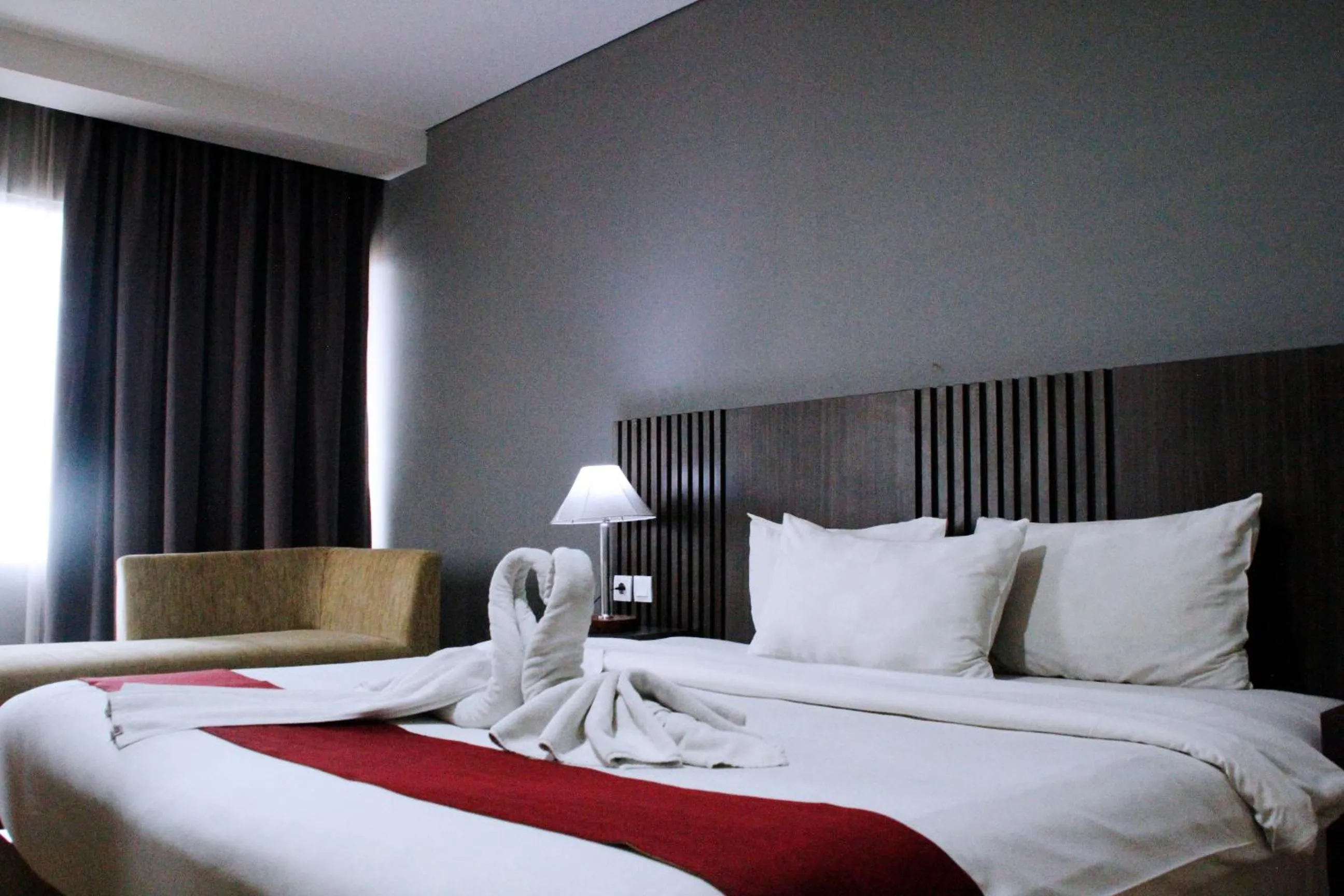 Seating area, Bed in Merapi Merbabu Hotels Bekasi