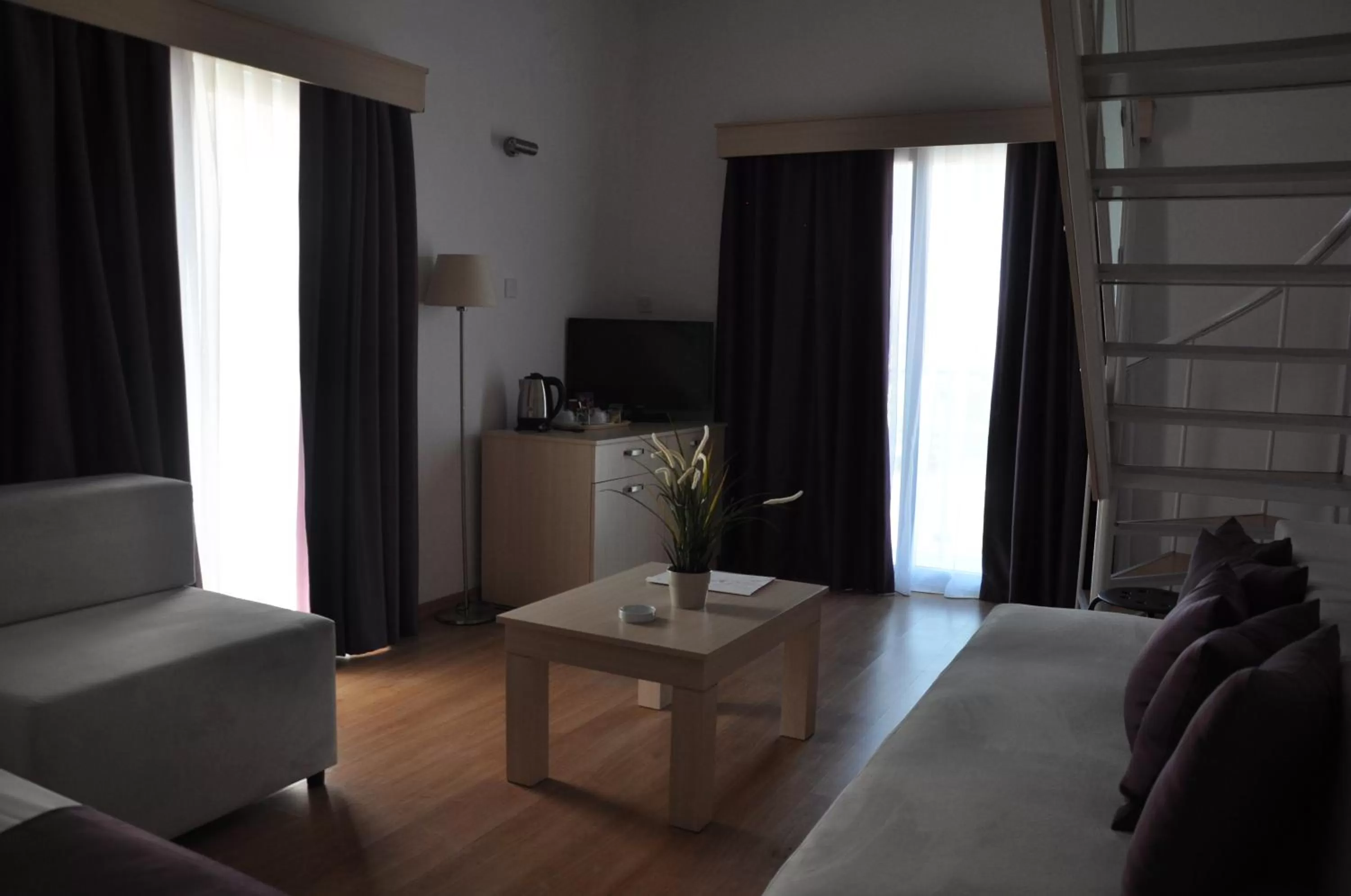 Communal lounge/ TV room in Manolya Hotel