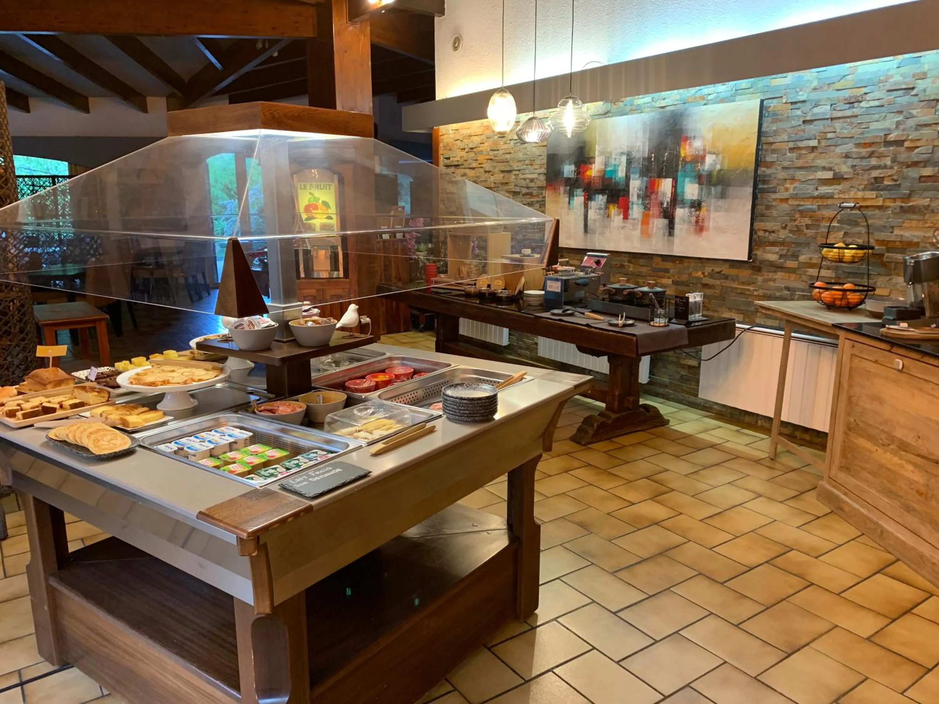 Buffet breakfast in Logis Hotel Le Lac