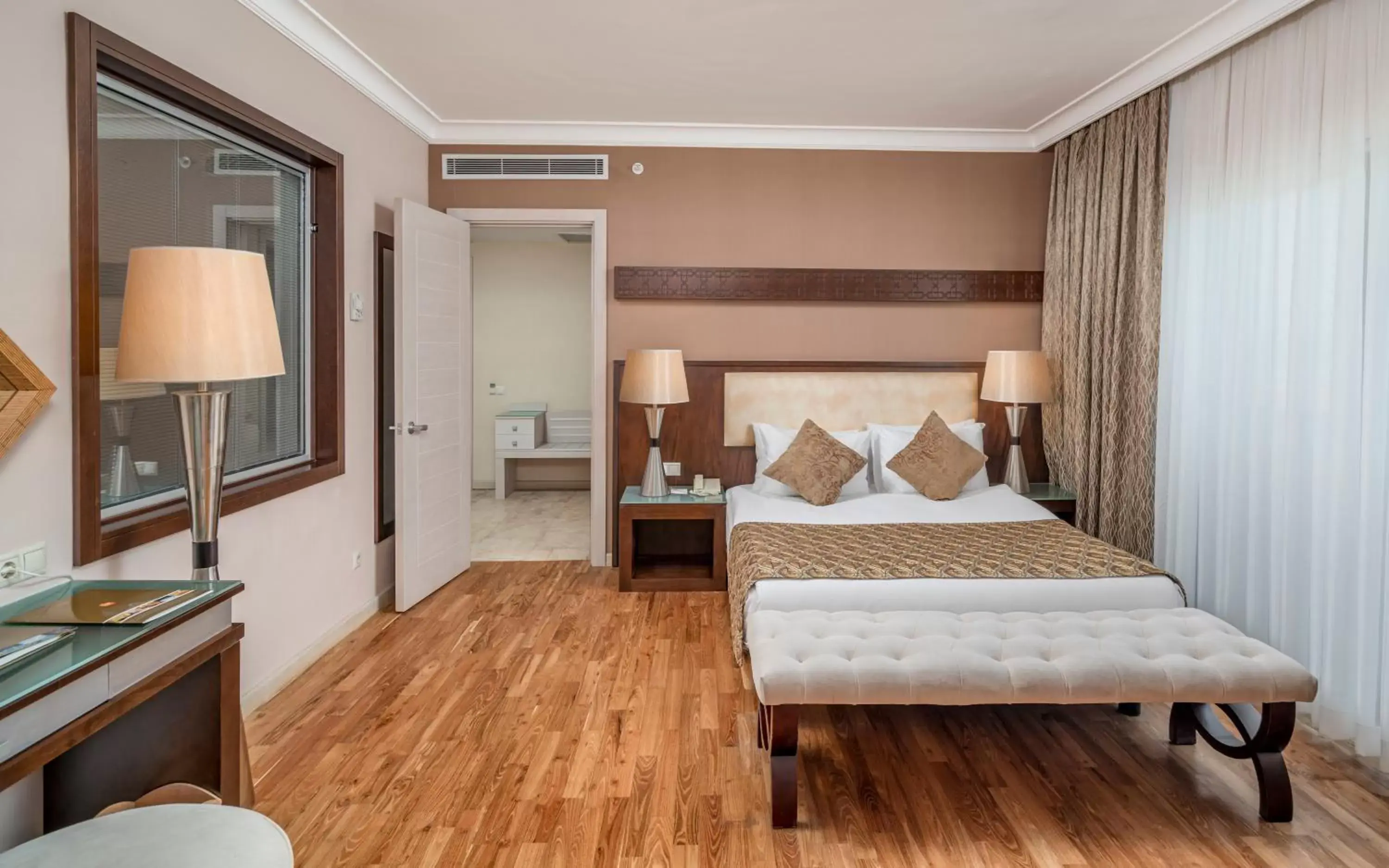 Bed in Mukarnas Spa & Resort Hotel