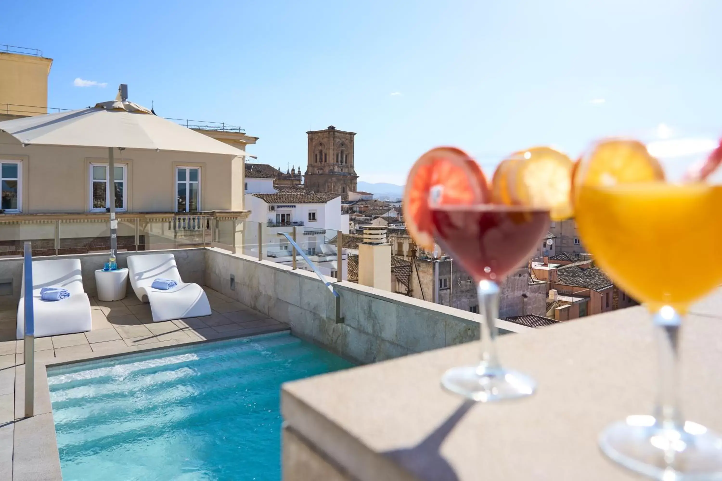 Swimming pool in Hotel Macià Granada Five Senses Rooms & Suites