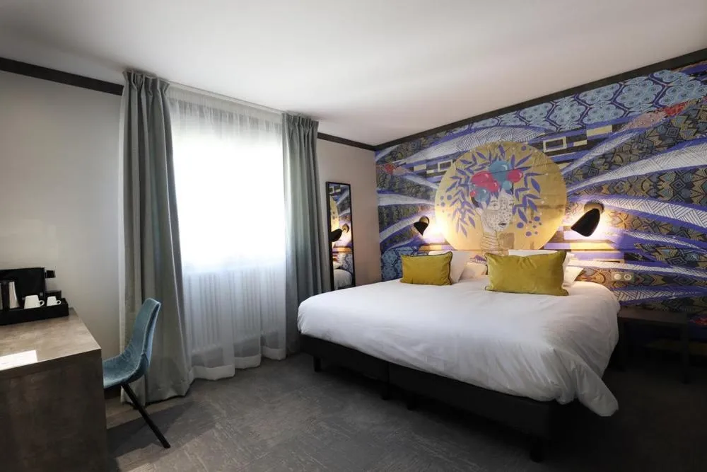 Bed in Hôtel la Capelle Millau