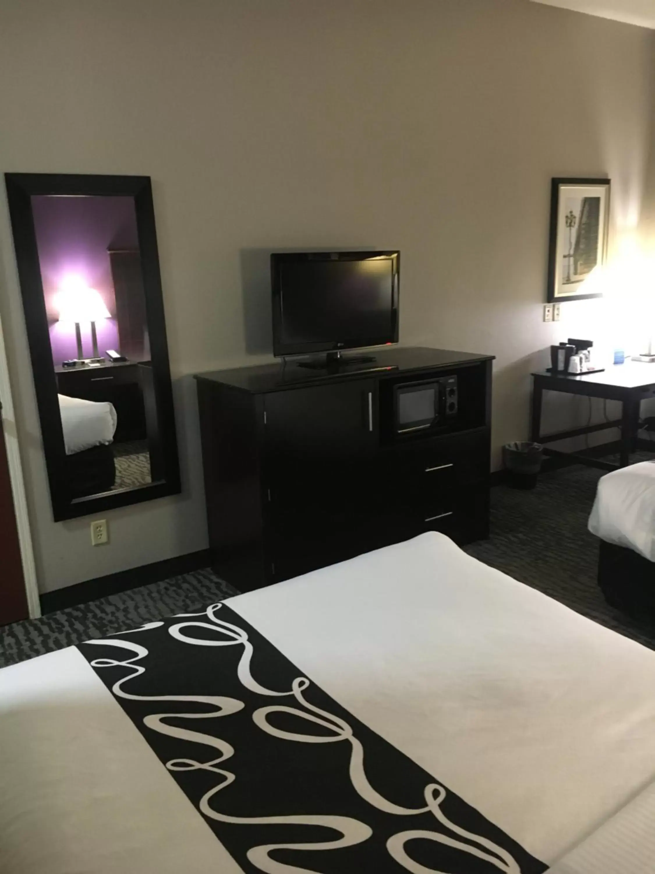 TV/Entertainment Center in La Quinta Inn & Suites by Wyndham Louisville East