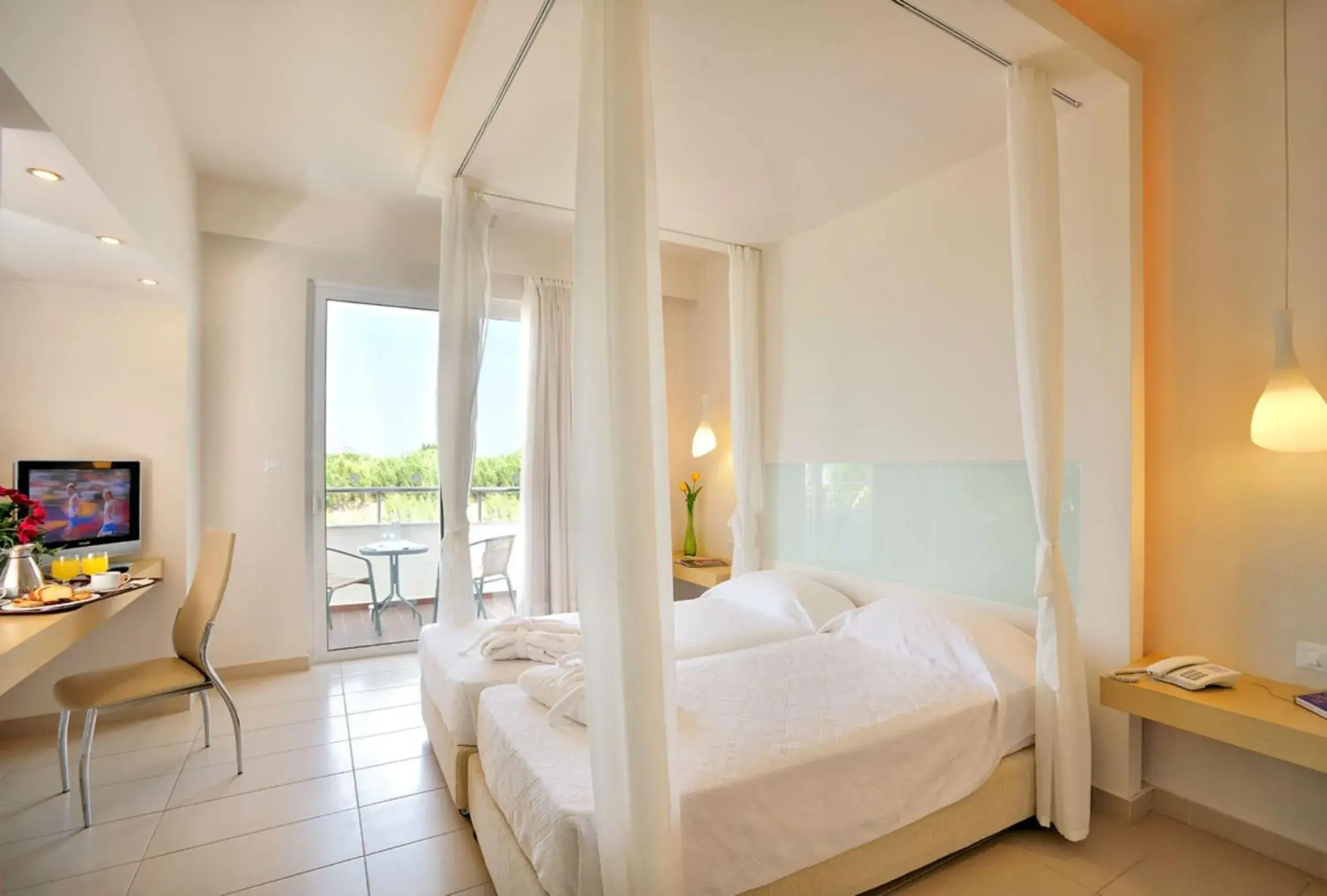 Bed in Afandou Bay Resort Suites