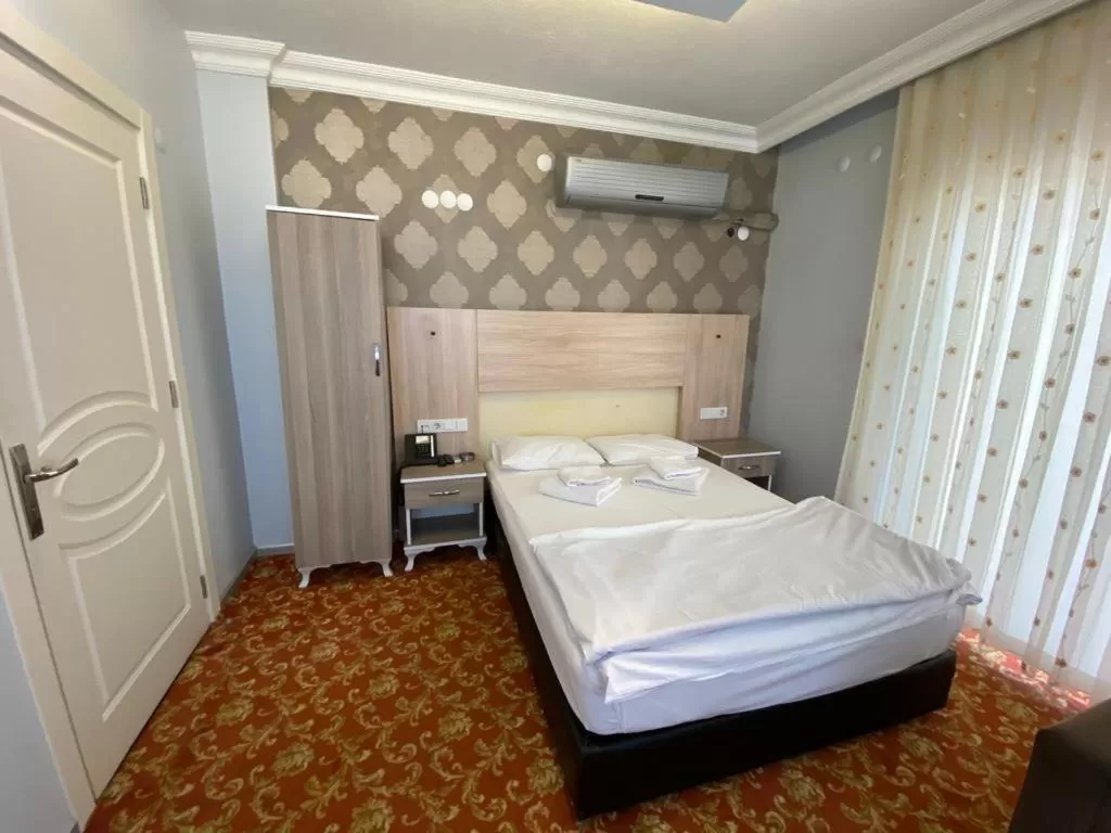 Bed in Sakran Hotel