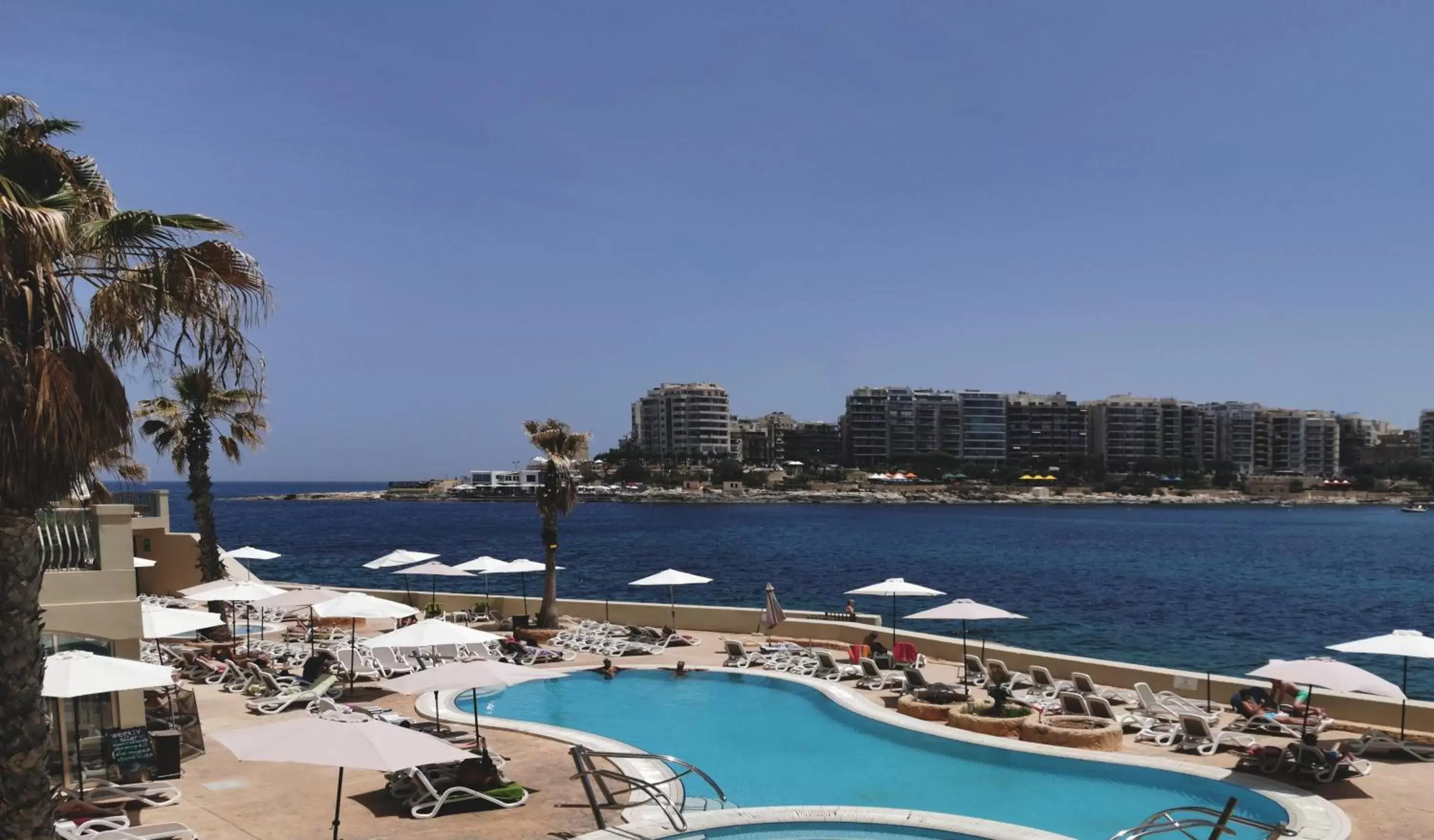 Pool view in Cavalieri Hotel Malta, a member of Radisson Individuals Pool view in Cavalieri Hotel Malta, a member of Radisson Individuals