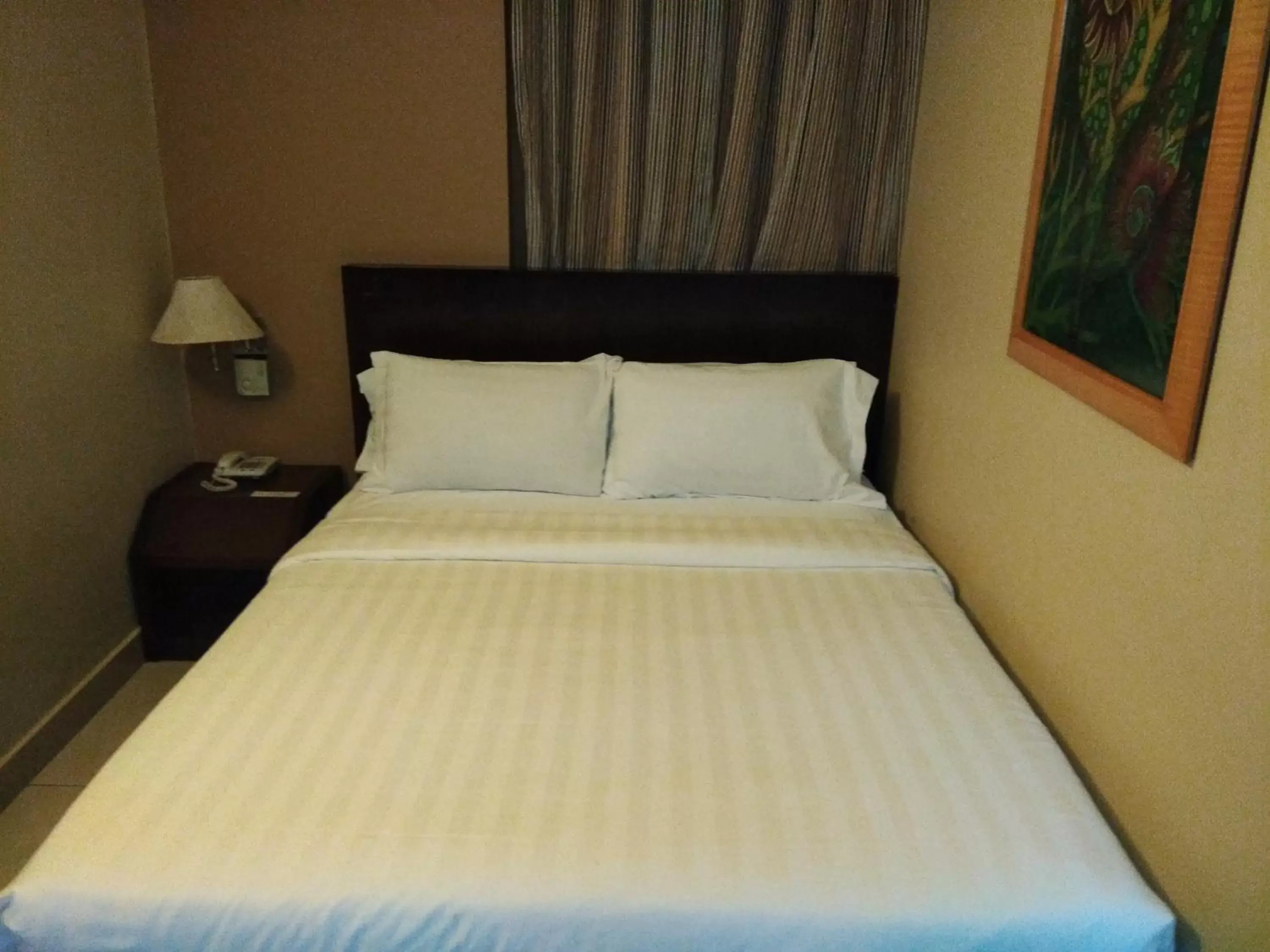 Bed in Kinabalu Daya Hotel