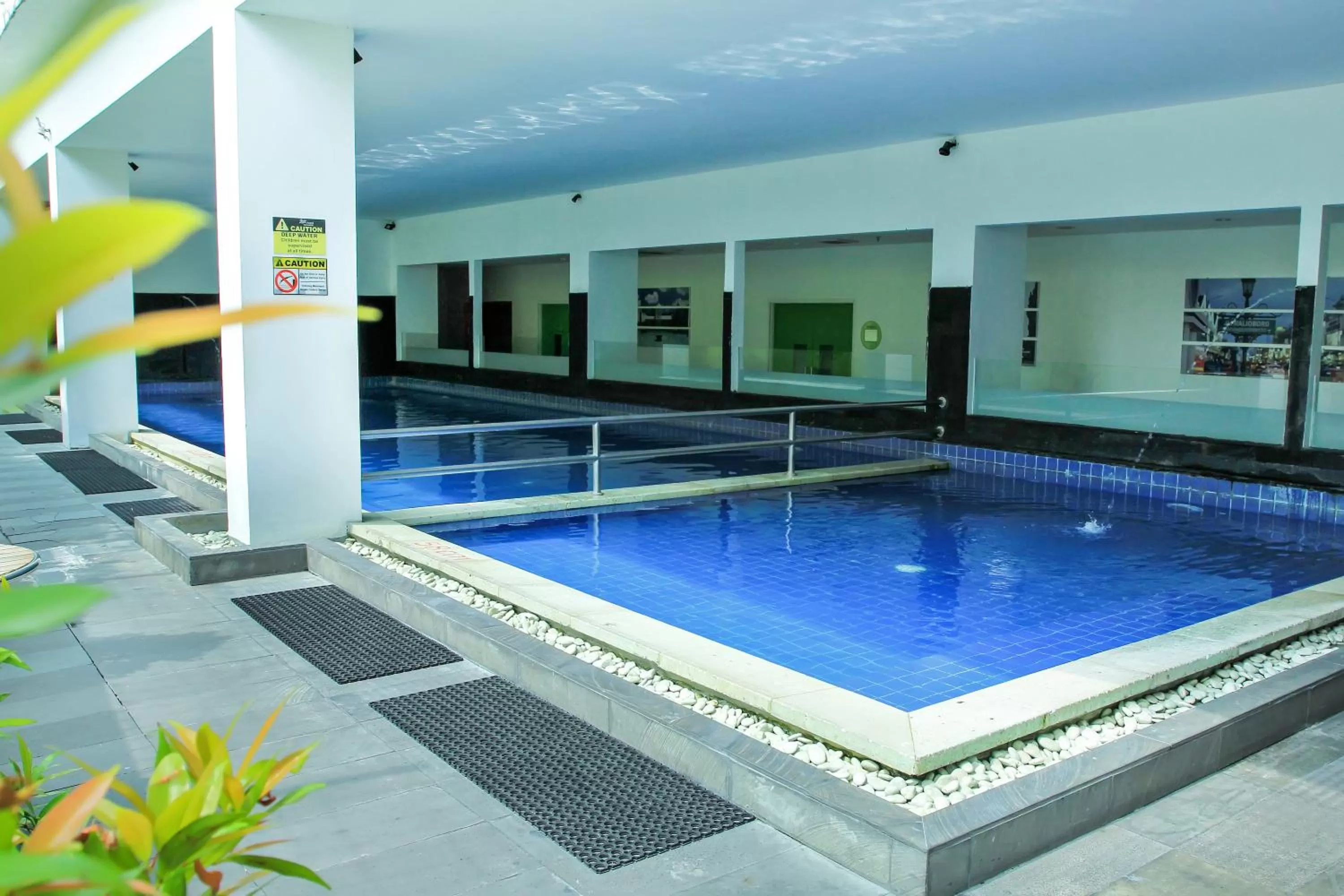 Swimming pool in Zest Yogyakarta by Swiss-Belhotel International