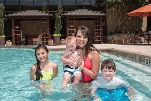 Swimming pool, Family in MCM Eleganté Hotel & Conference Center