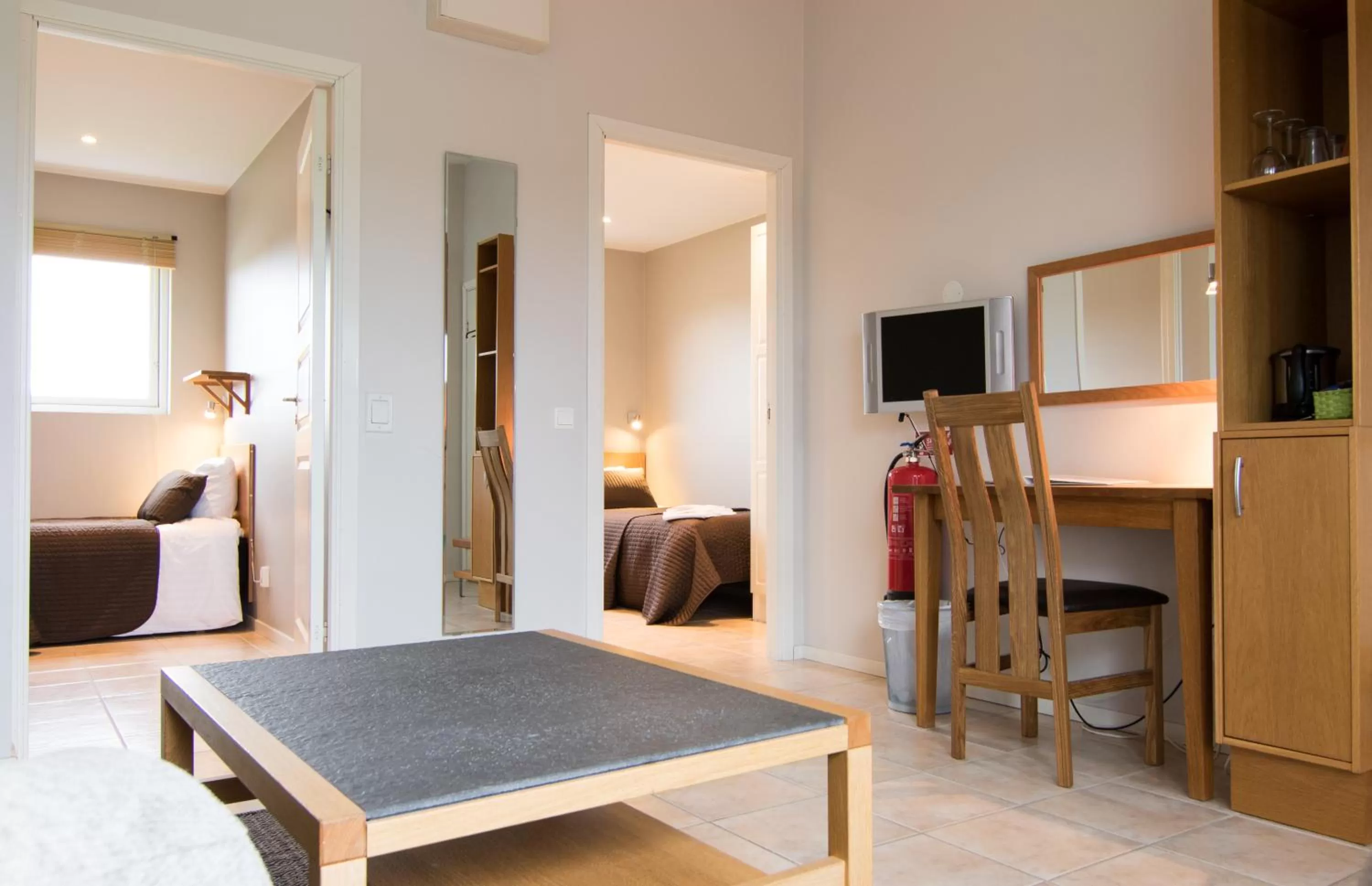 Living room, Bed in Tomelilla Golf Hotell