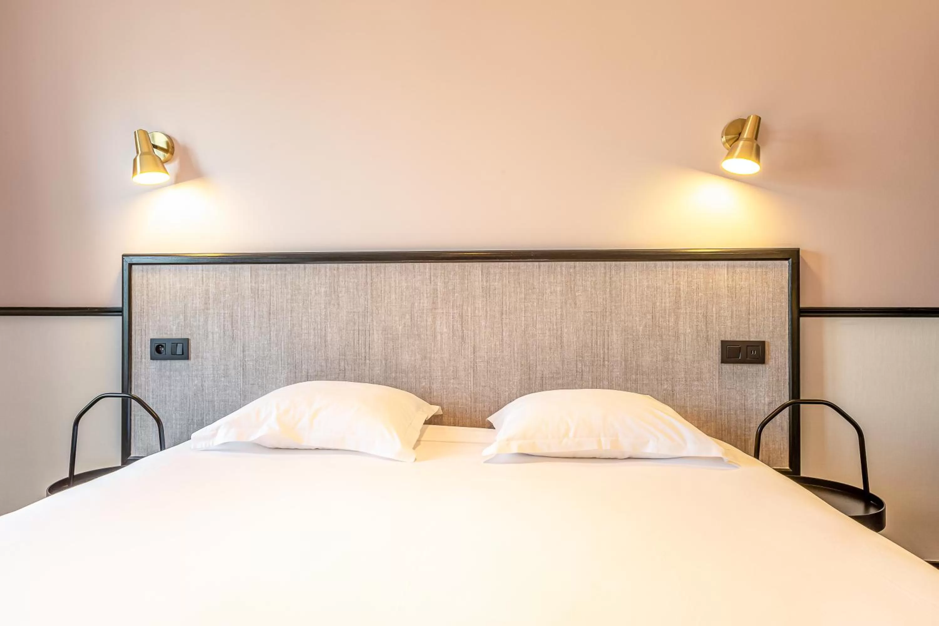 Bed in Hotel de l'Aqueduc