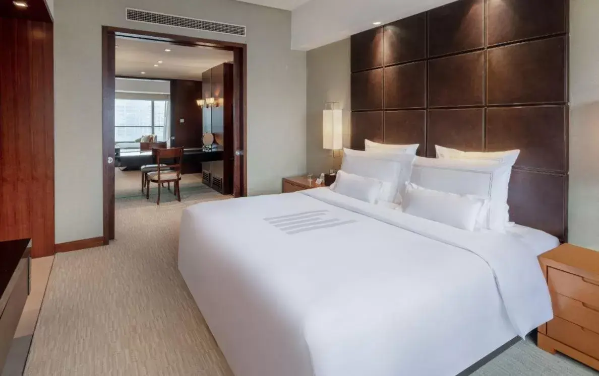 Bed in Grand Millennium Beijing