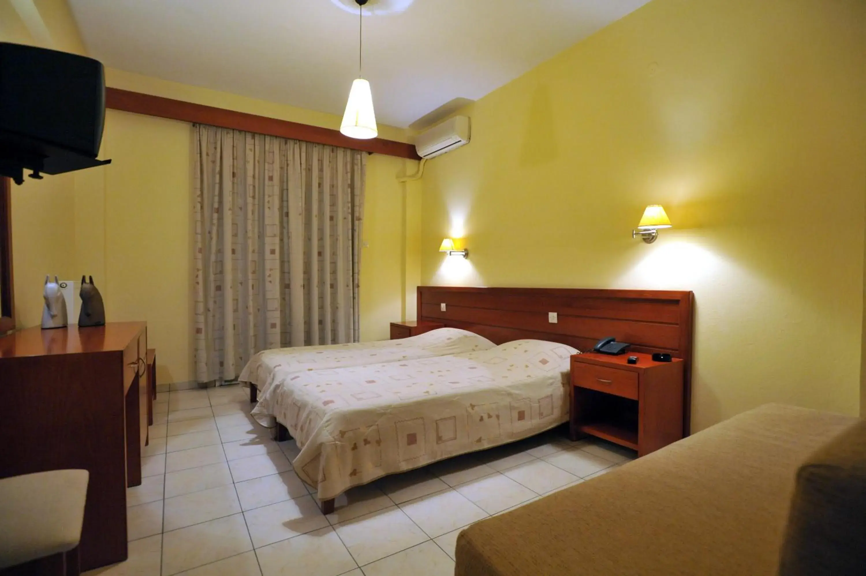 Bed in Hotel Kalloni