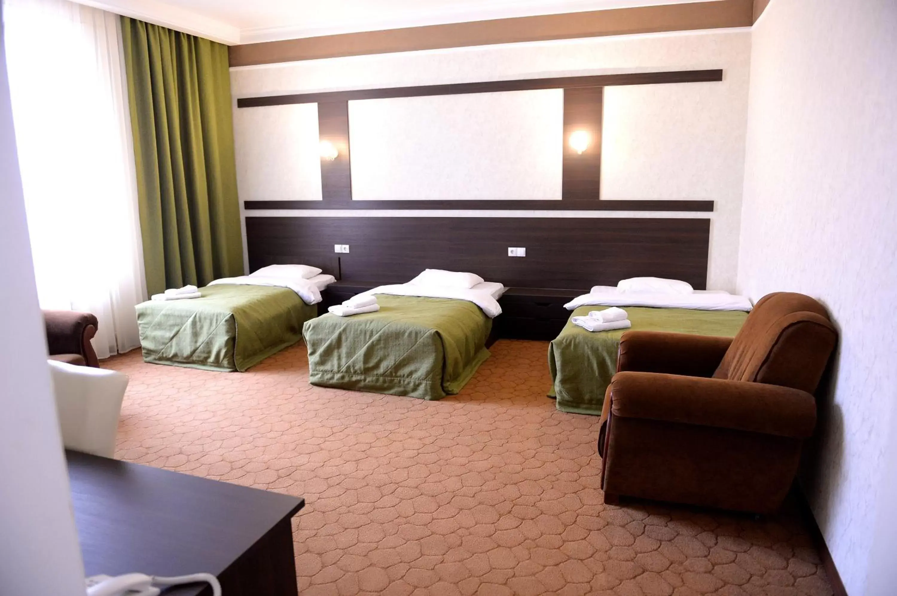 Comfort Triple Room with Shower in Pride Hotel Comfort Triple Room with Shower in Pride Hotel