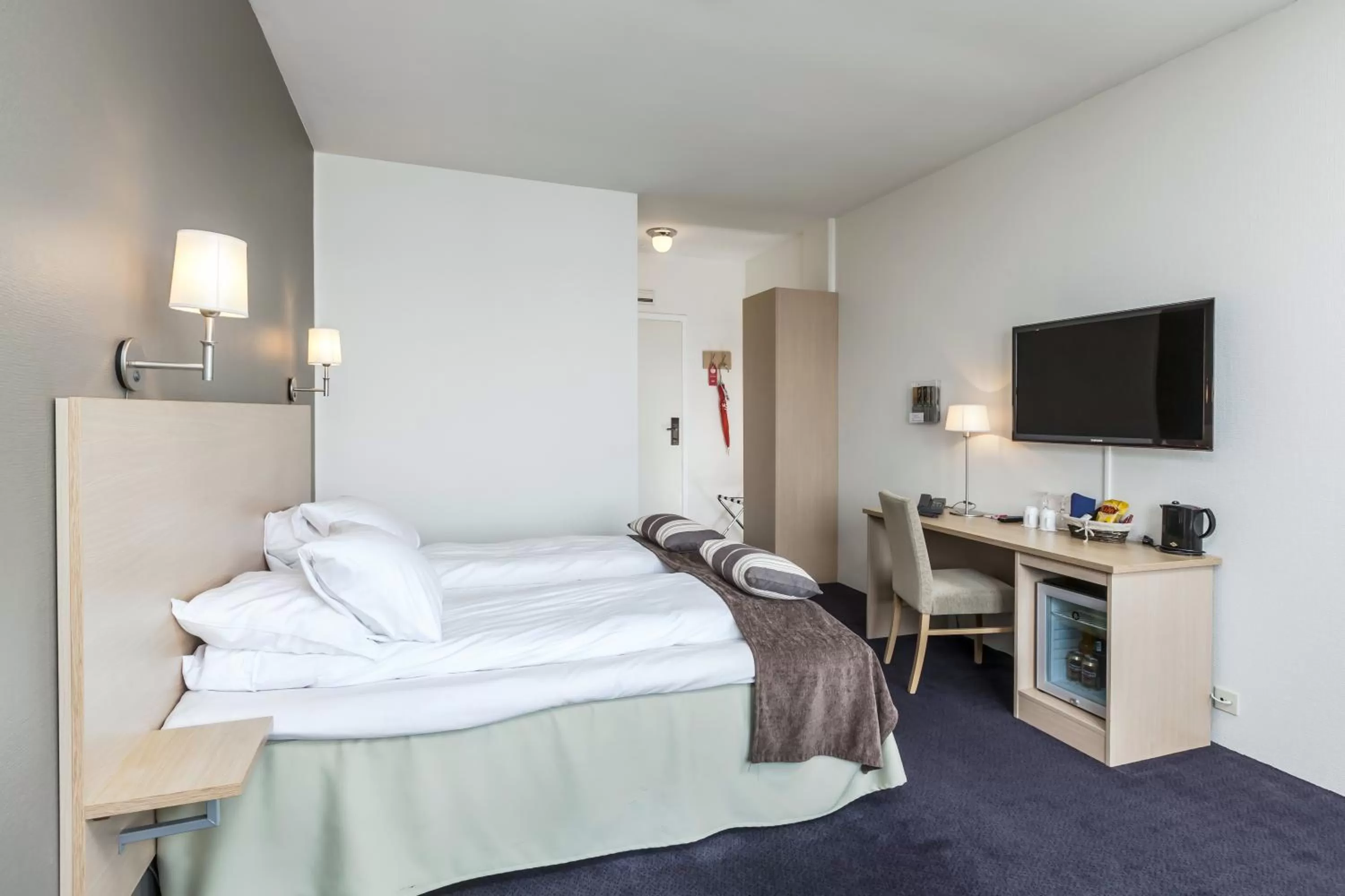 Photo of the whole room, Bed in Grand Hotel Åsgårdstrand - Unike Hoteller