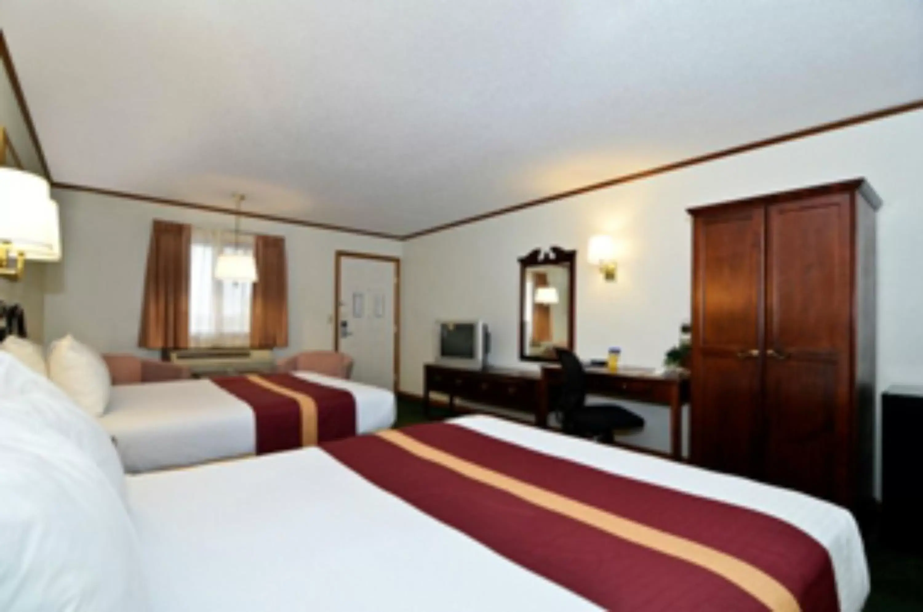 Bed in SureStay Hotel by Best Western Cameron