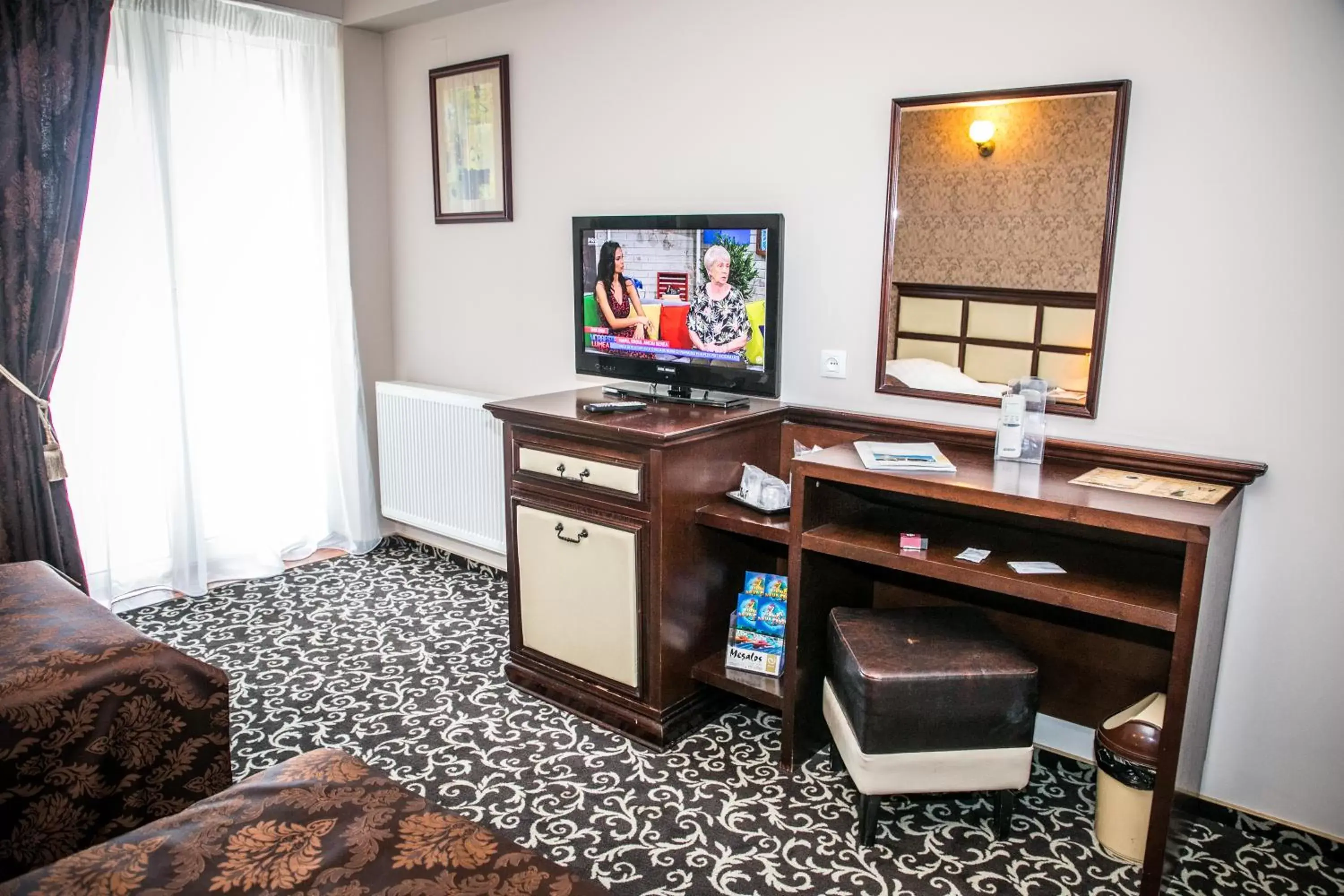 TV and multimedia, TV/Entertainment Center in Hotel Megalos