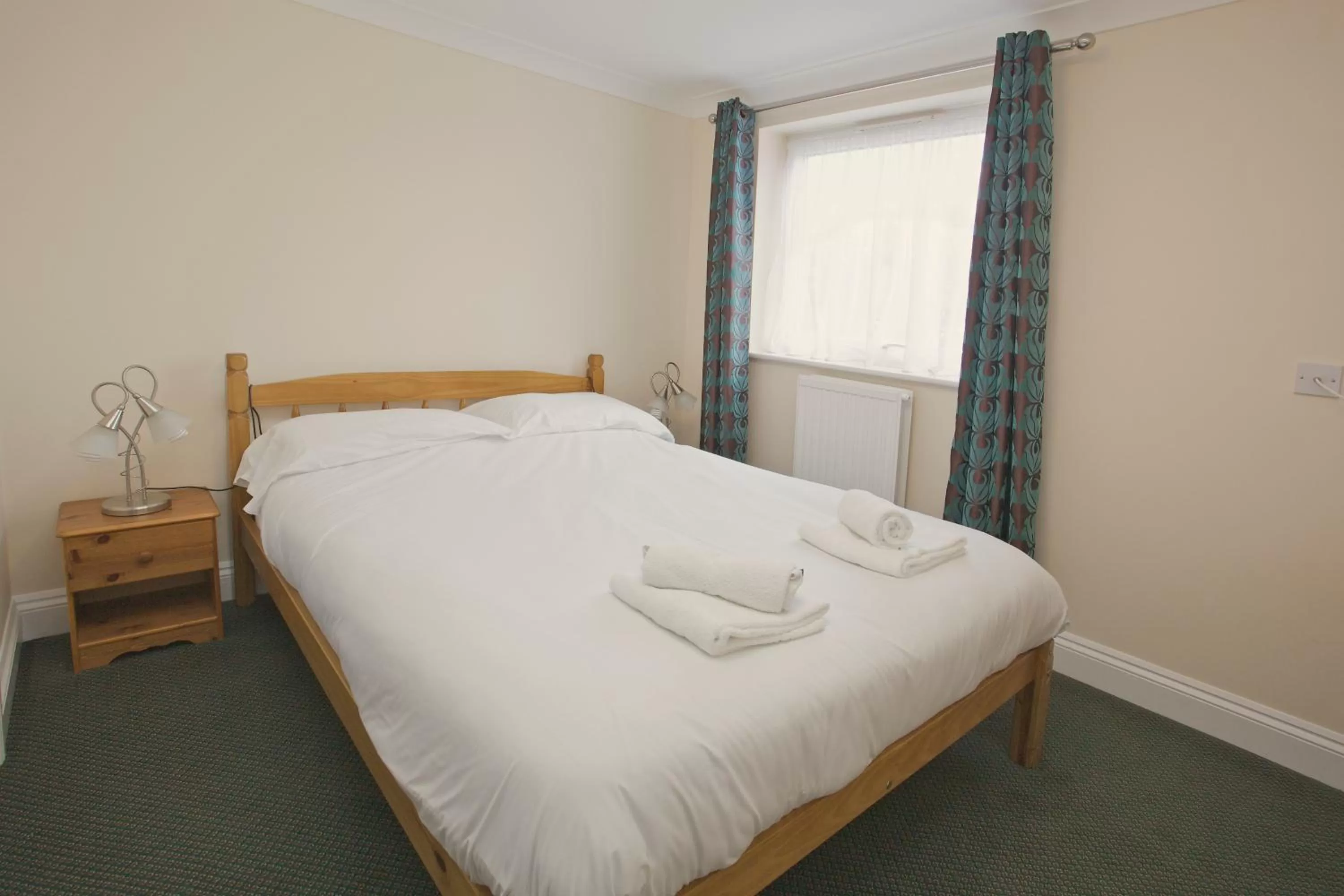 Bedroom in All Seasons Lodge Hotel