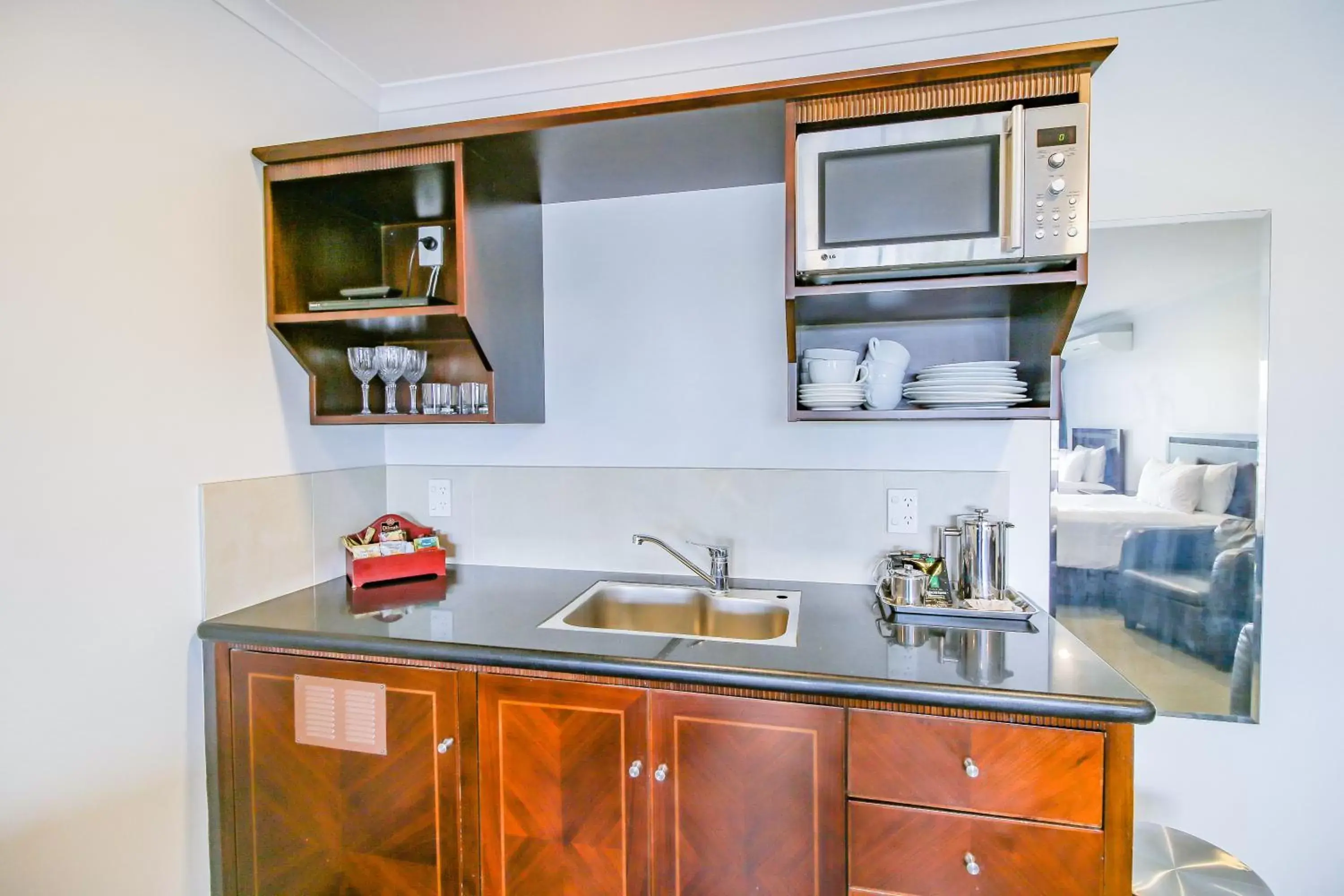 Kitchen/Kitchenette in Aotea Motor Lodge