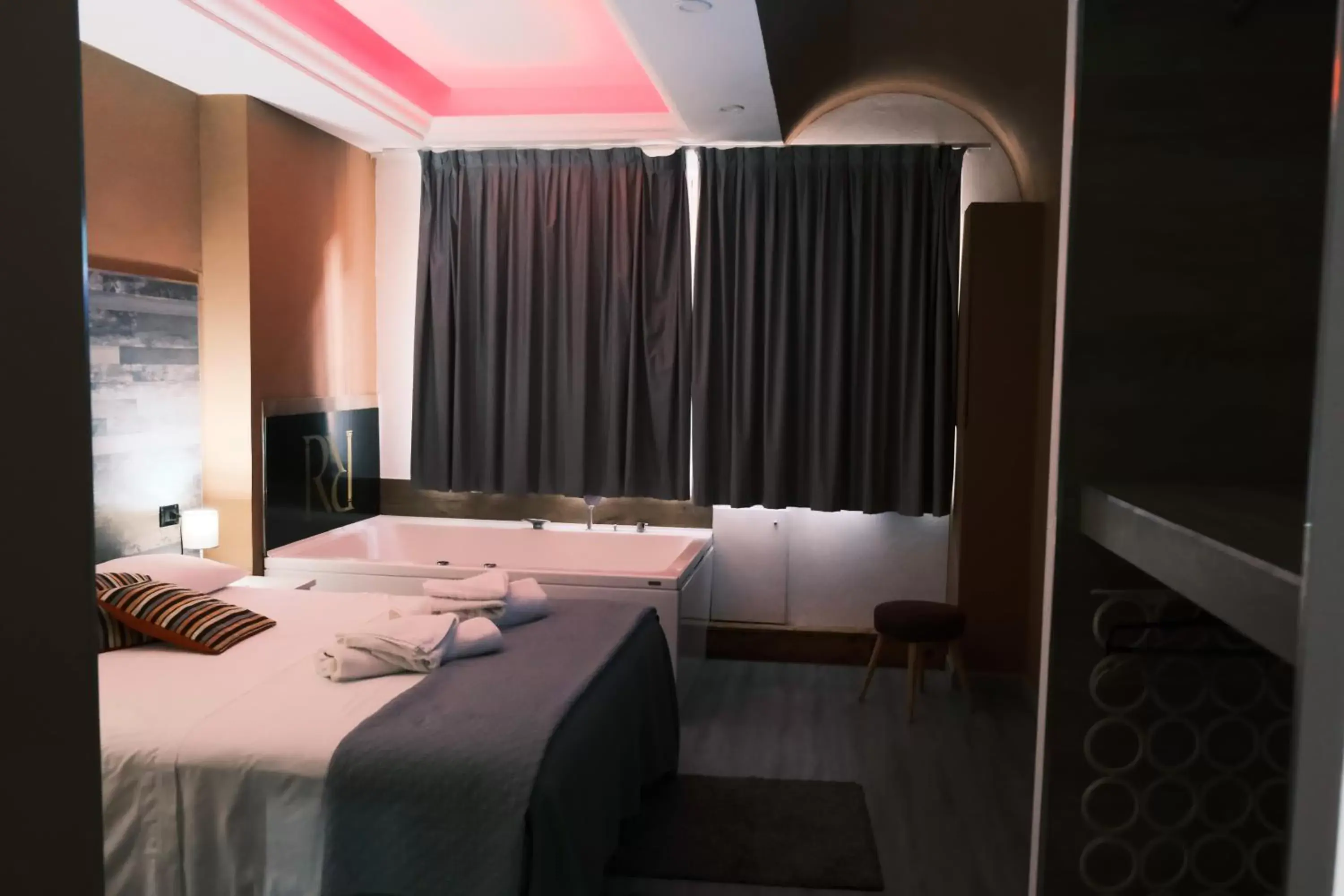 Bed, Bathroom in Royalty Rooms & Spa