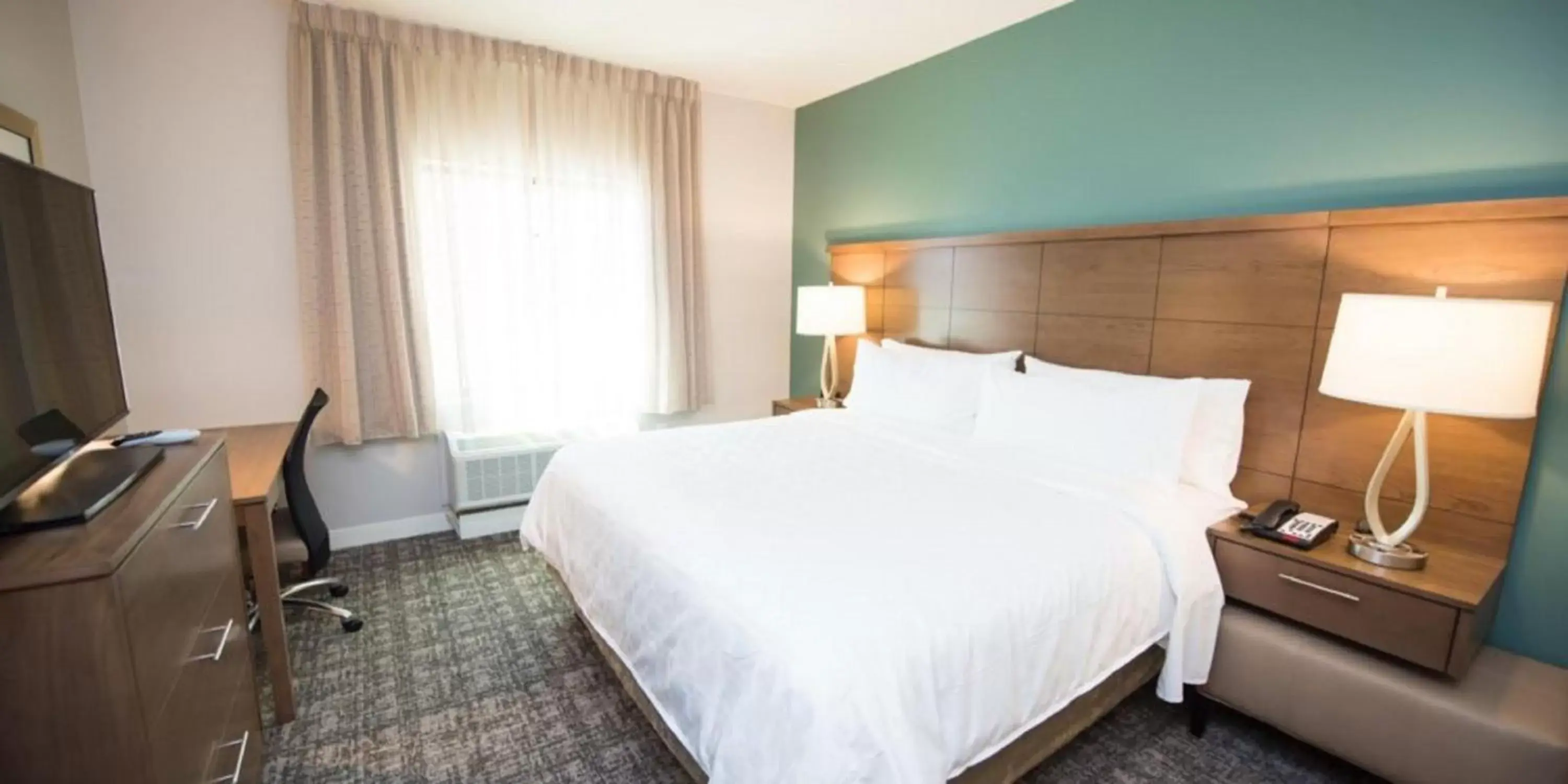 Photo of the whole room, Bed in Staybridge Suites Houston East - Baytown, an IHG Hotel