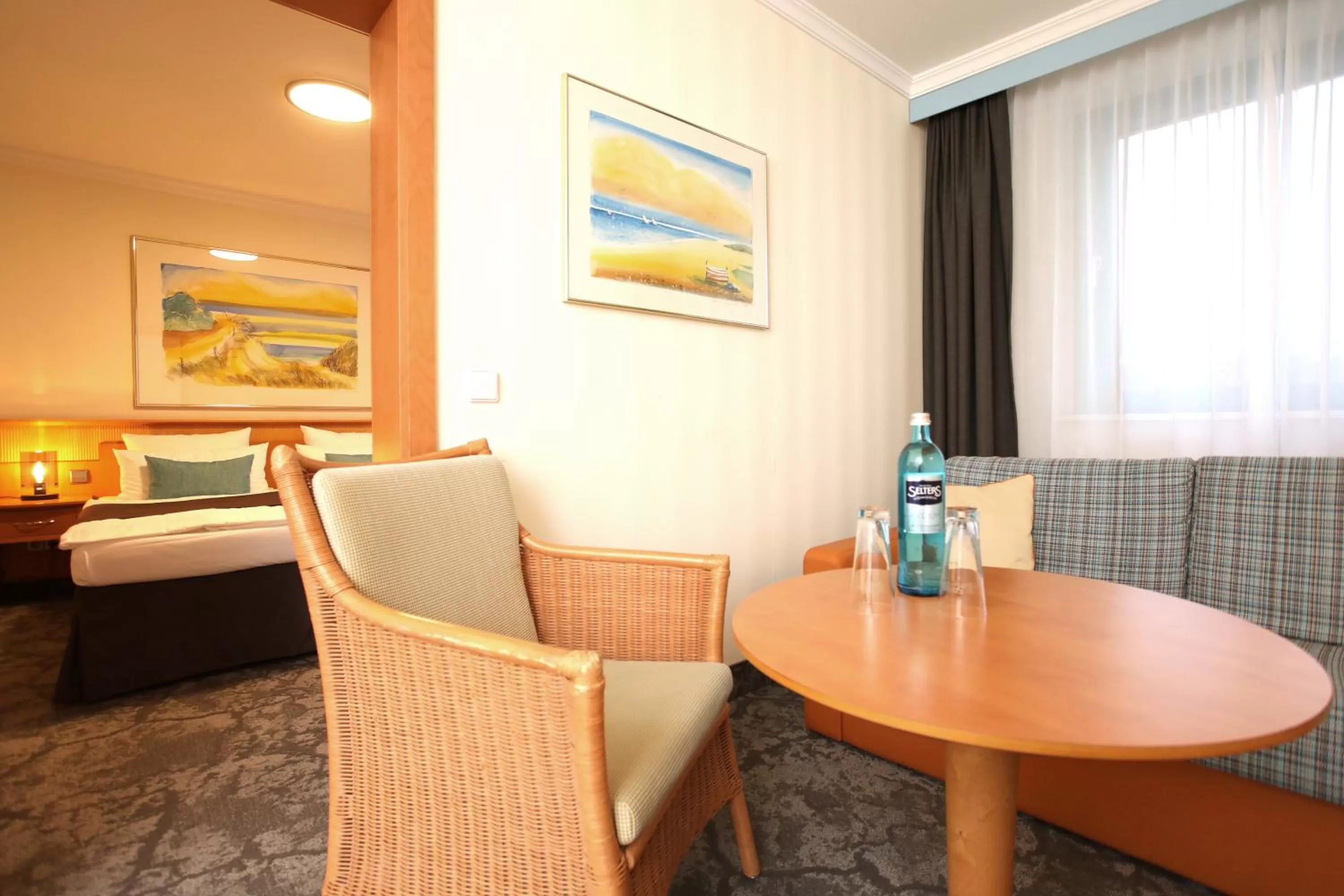 Seating area, Bed in Hotel Bernstein Prerow