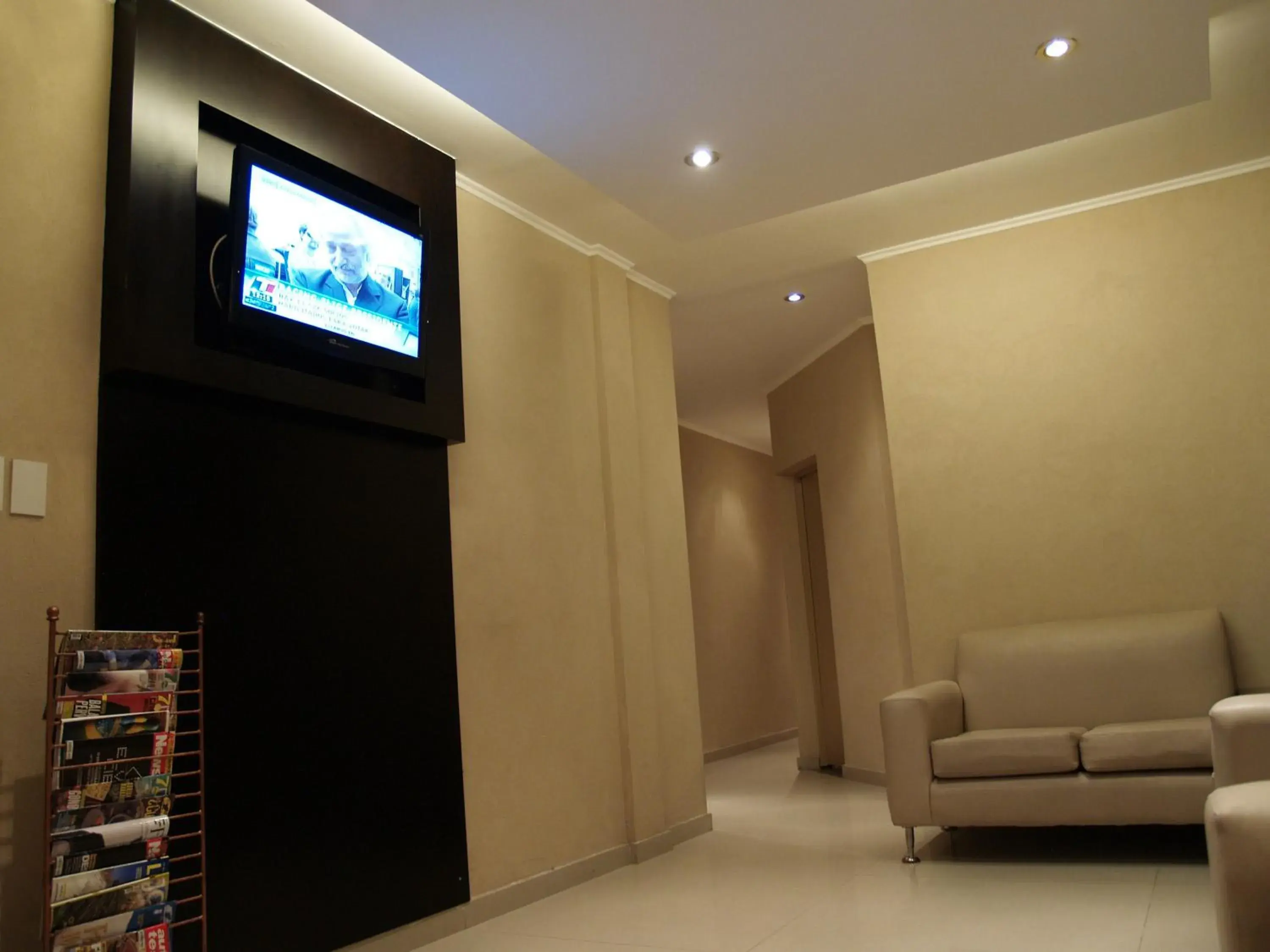 TV and multimedia, TV/Entertainment Center in Hotel El Cabildo