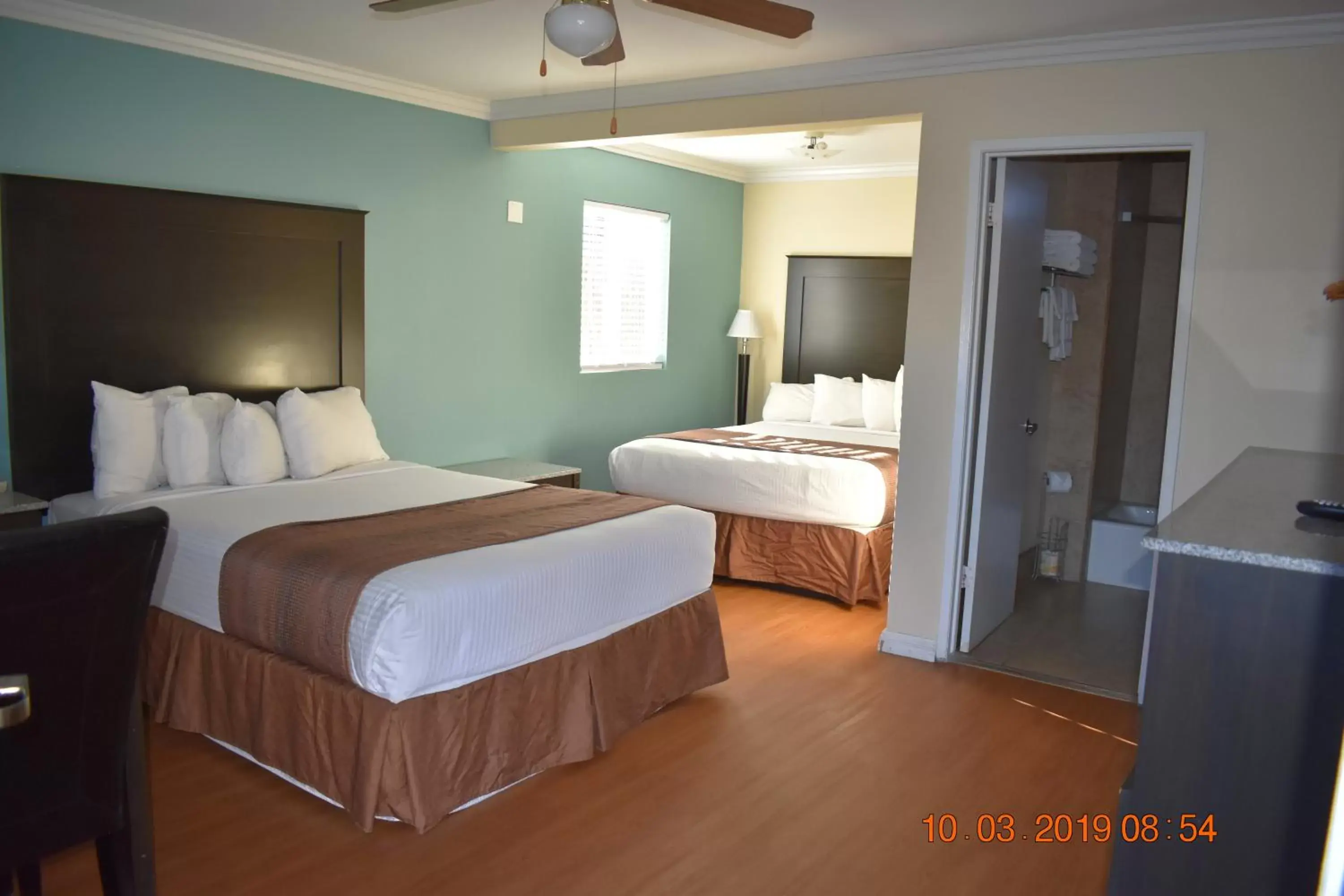 Bed in Rockview Inn and Suites