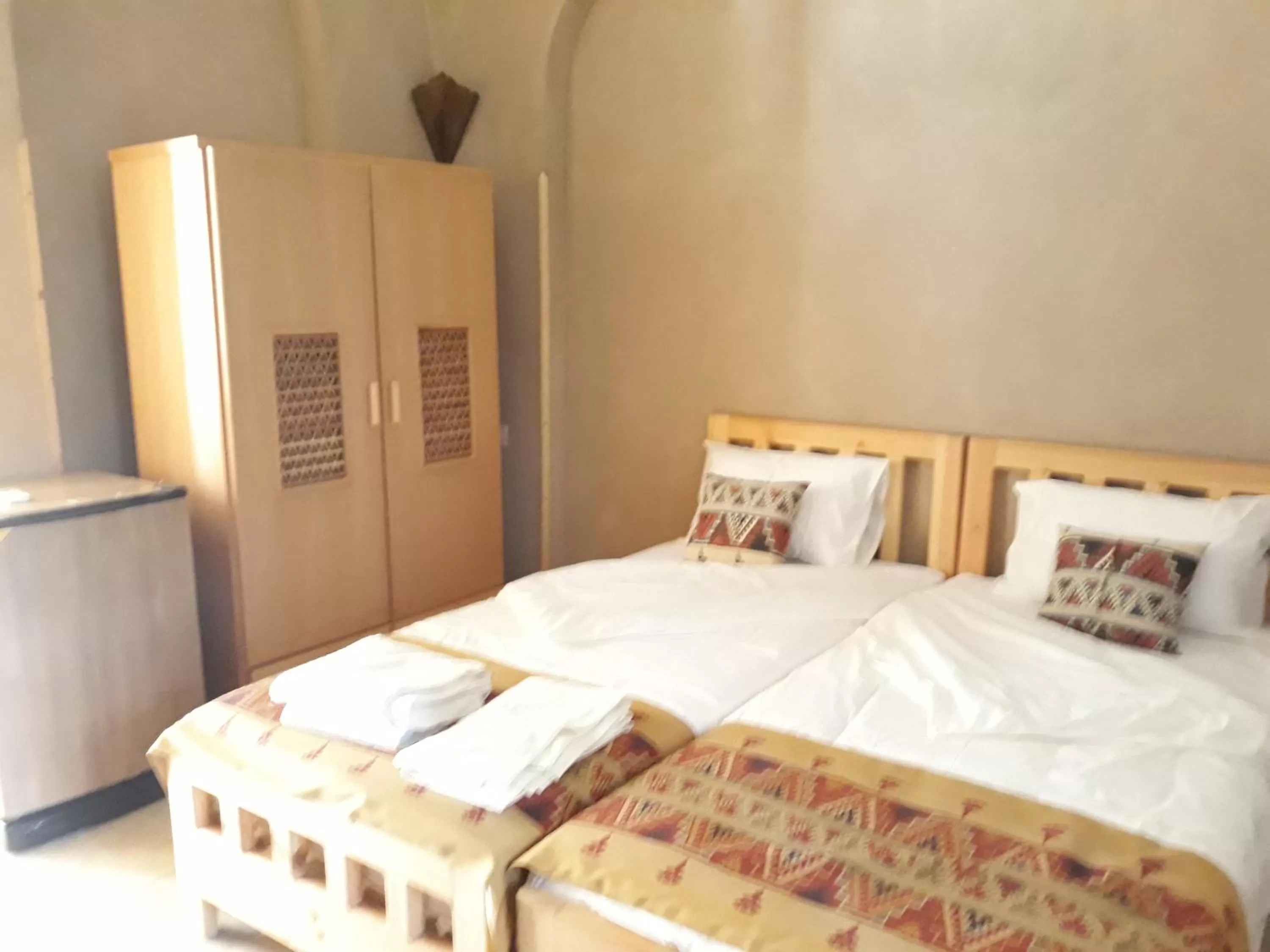 Bed in Embrace Hotel