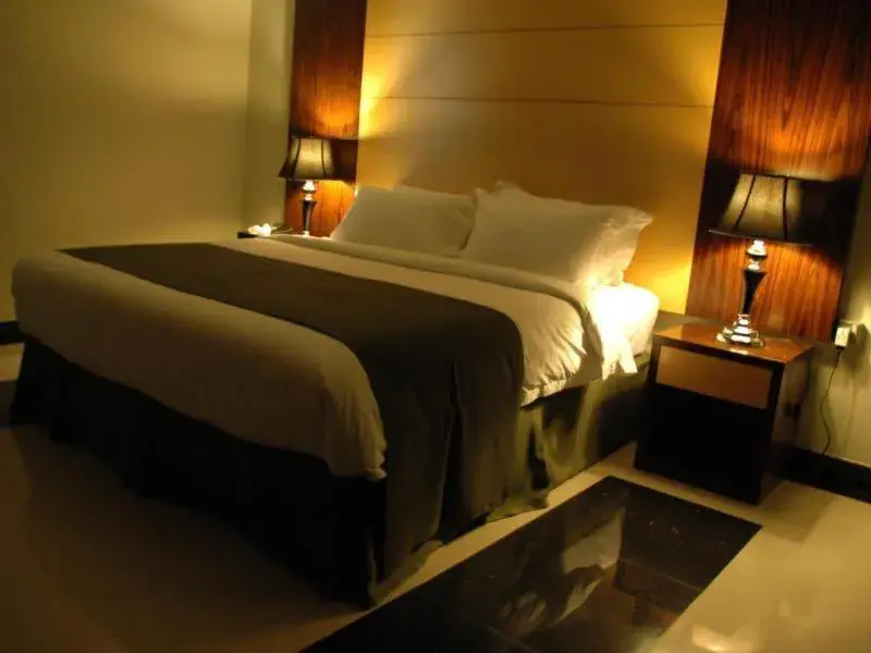 Bed in Doha Dynasty Hotel