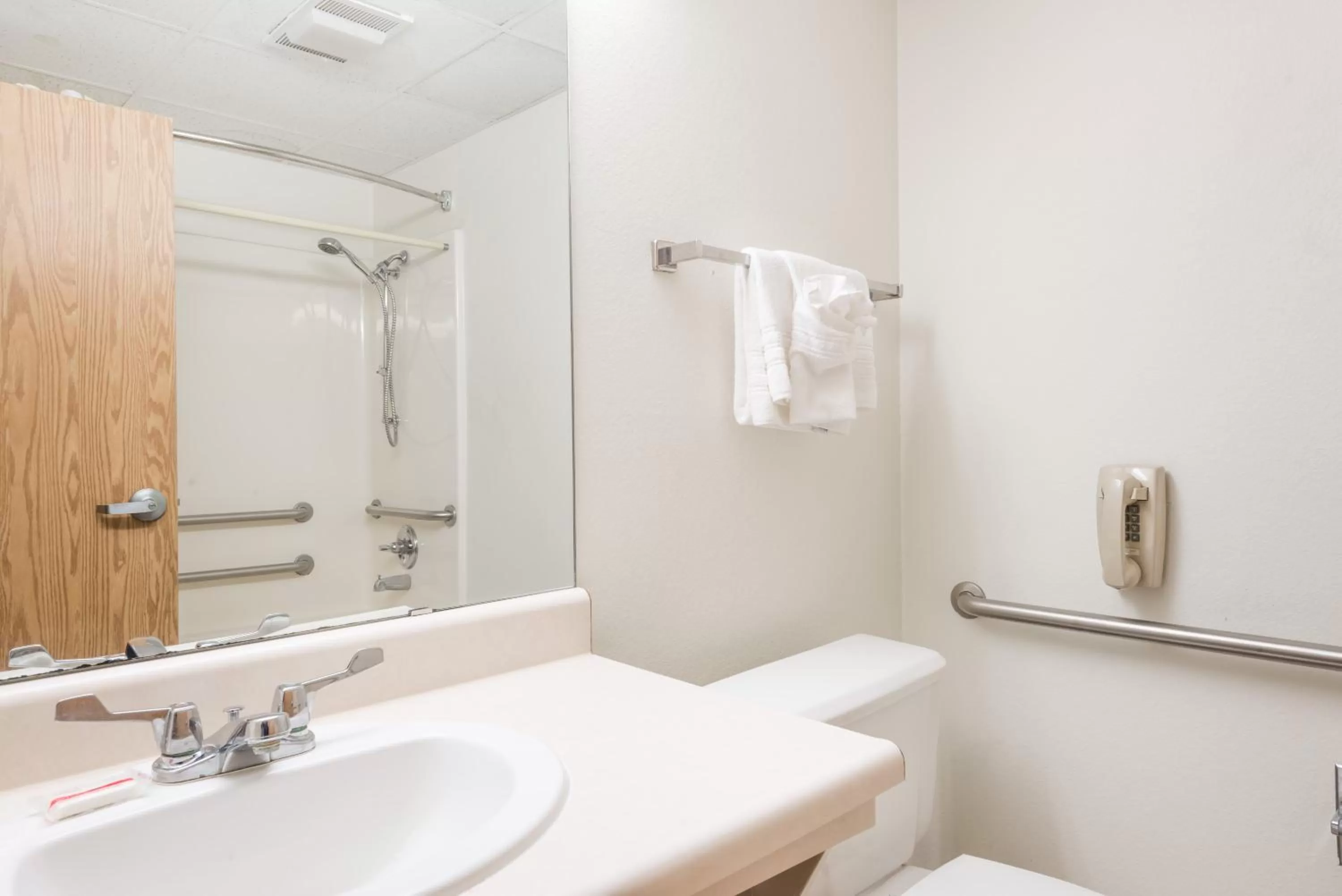 Bathroom in Super 8 by Wyndham Independence KS