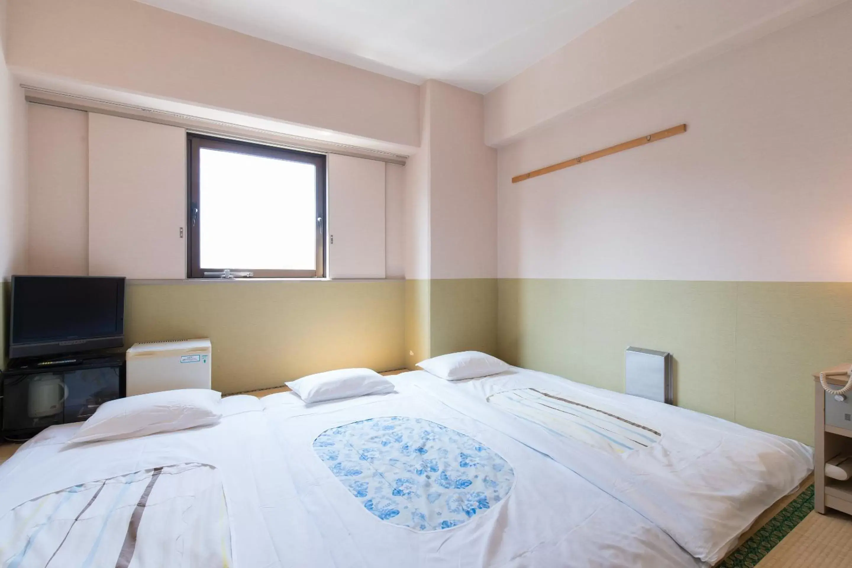 Photo of the whole room, Bed in Tabist Hotel Tetora Kitakyushu