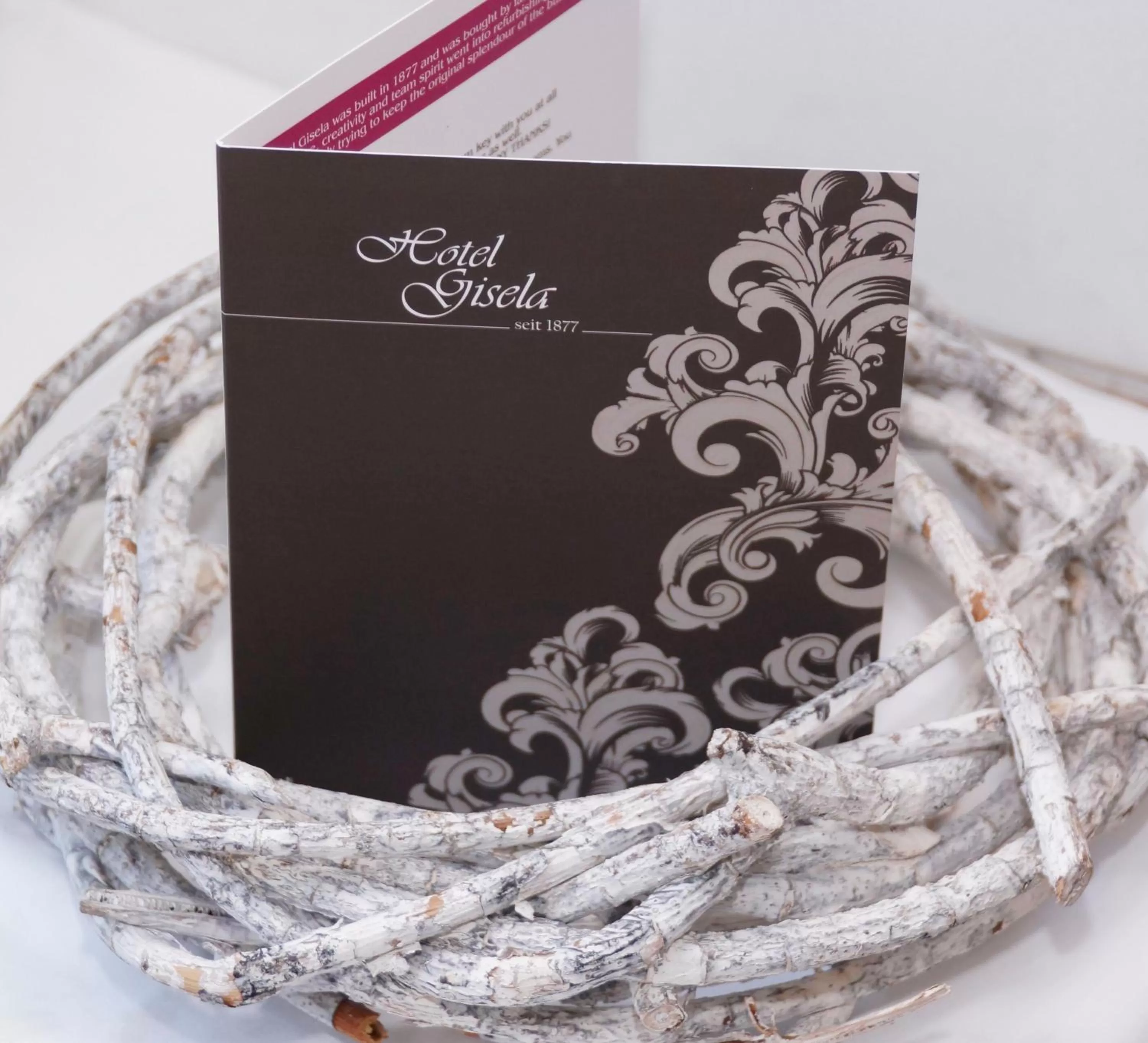 Property logo or sign in Hotel Gisela