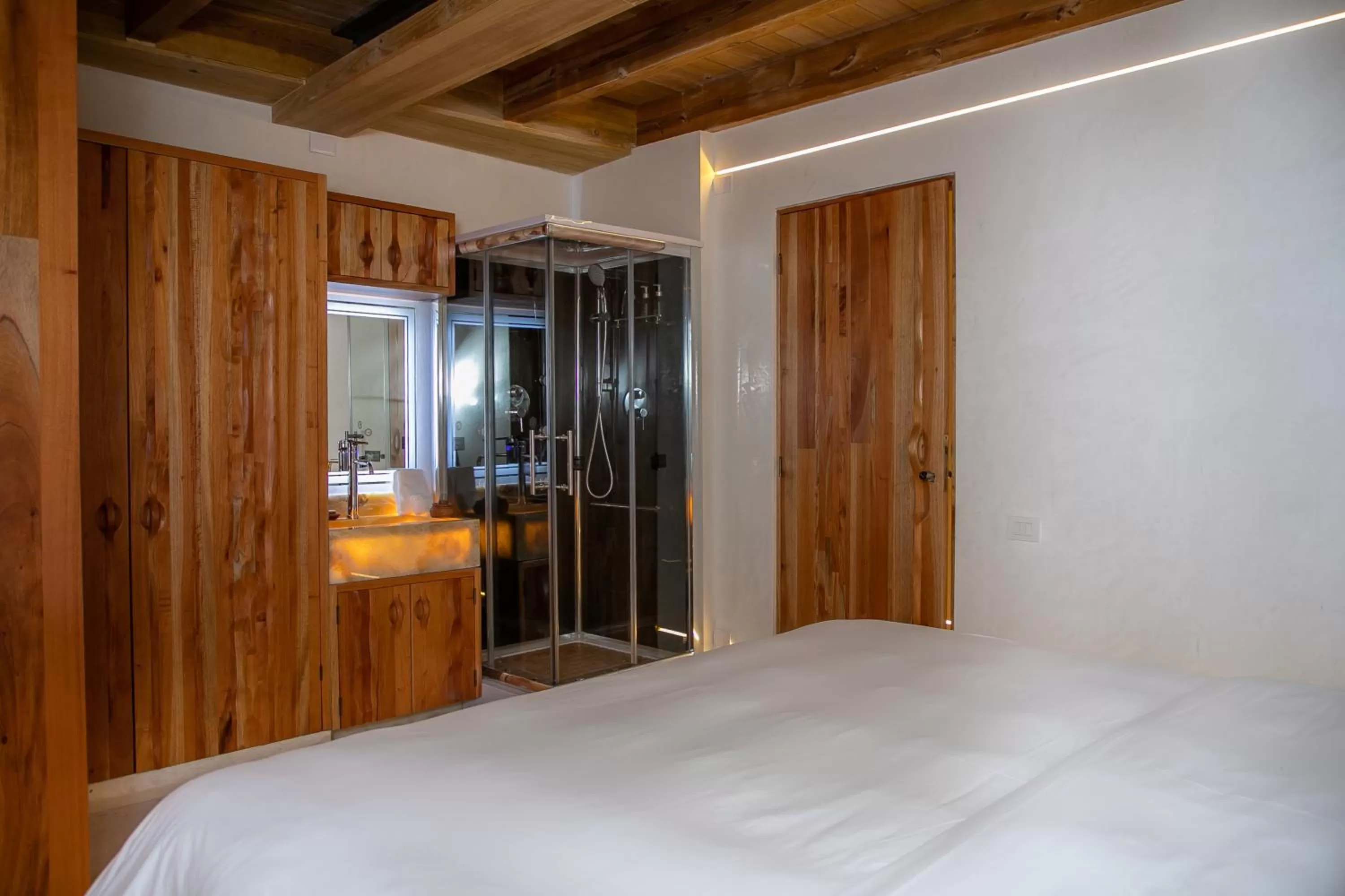 Bathroom, Bed in El Santuario Resort & Spa
