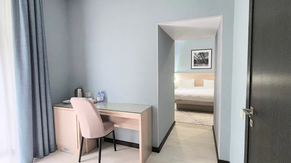 Photo of the whole room, TV/Entertainment Center in Resident Hotel Gogol