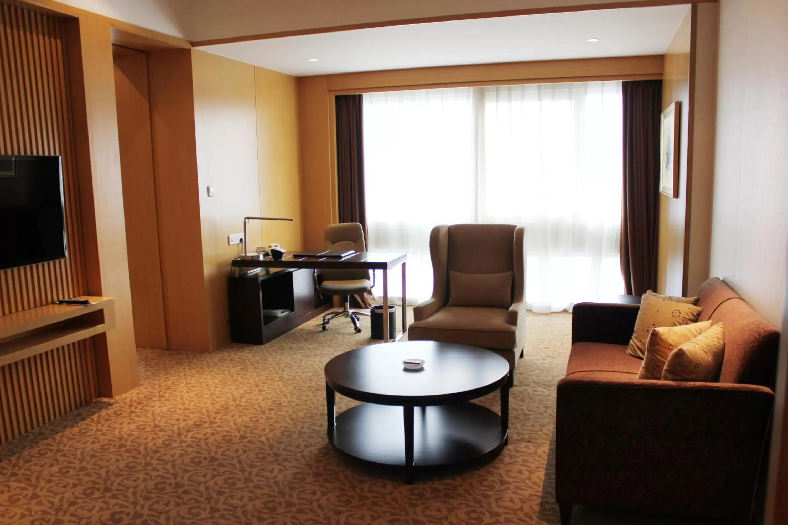 Living room, Seating Area in Holiday Inn Shijiazhuang Central, an IHG Hotel
