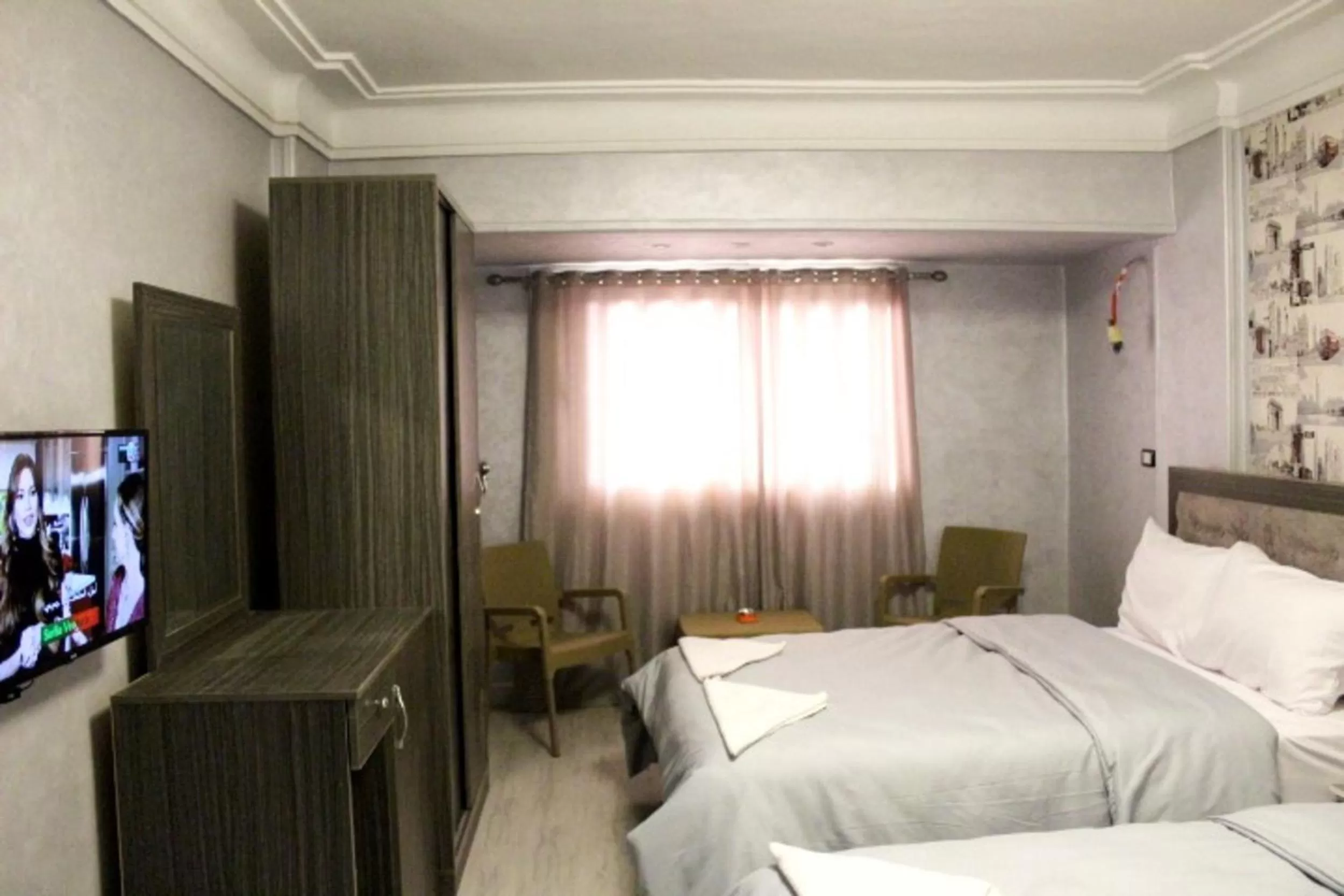 TV/Entertainment Center in Hostel Sunset Down town