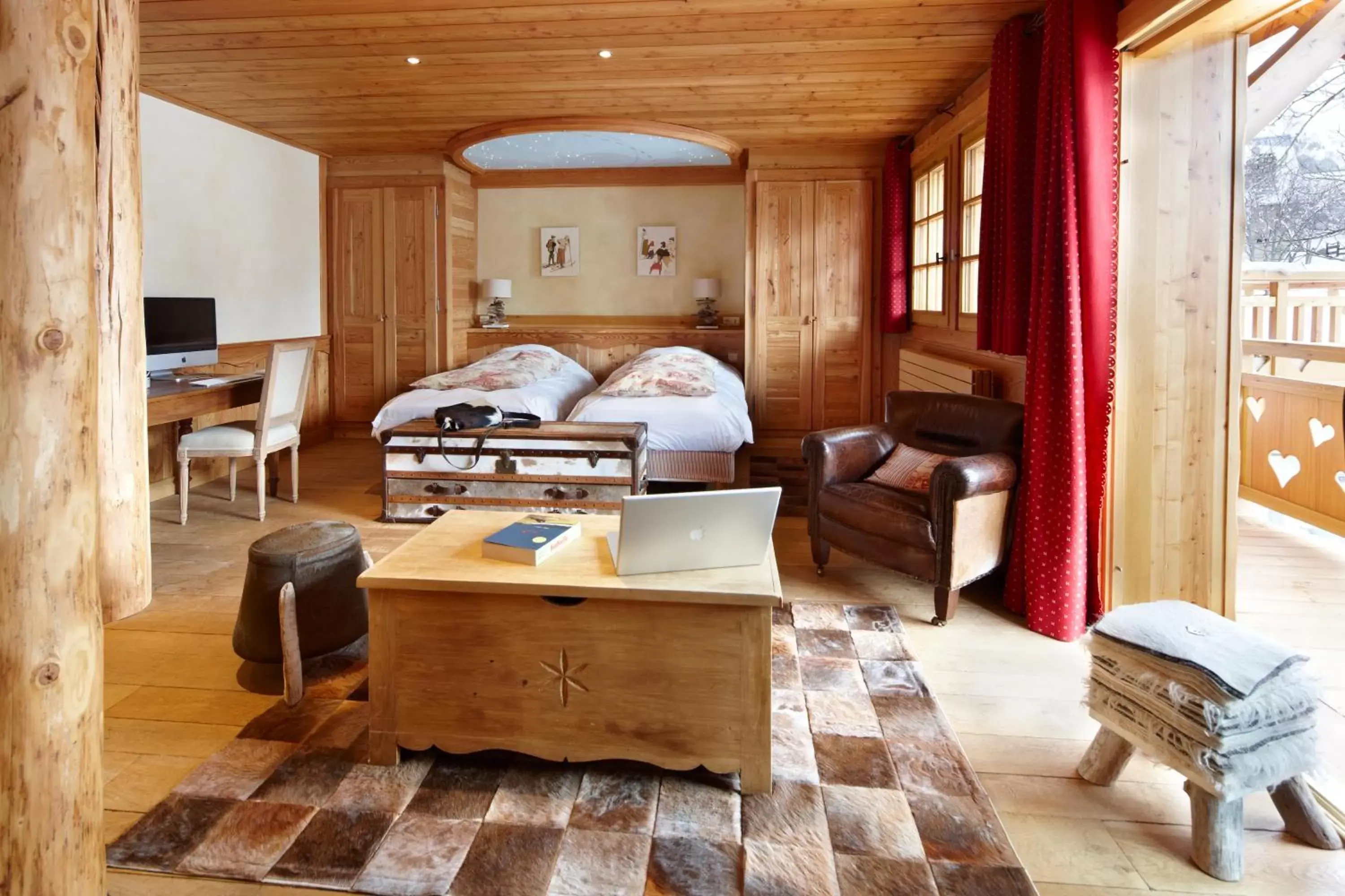 Bed, Seating Area in Chalet Mounier