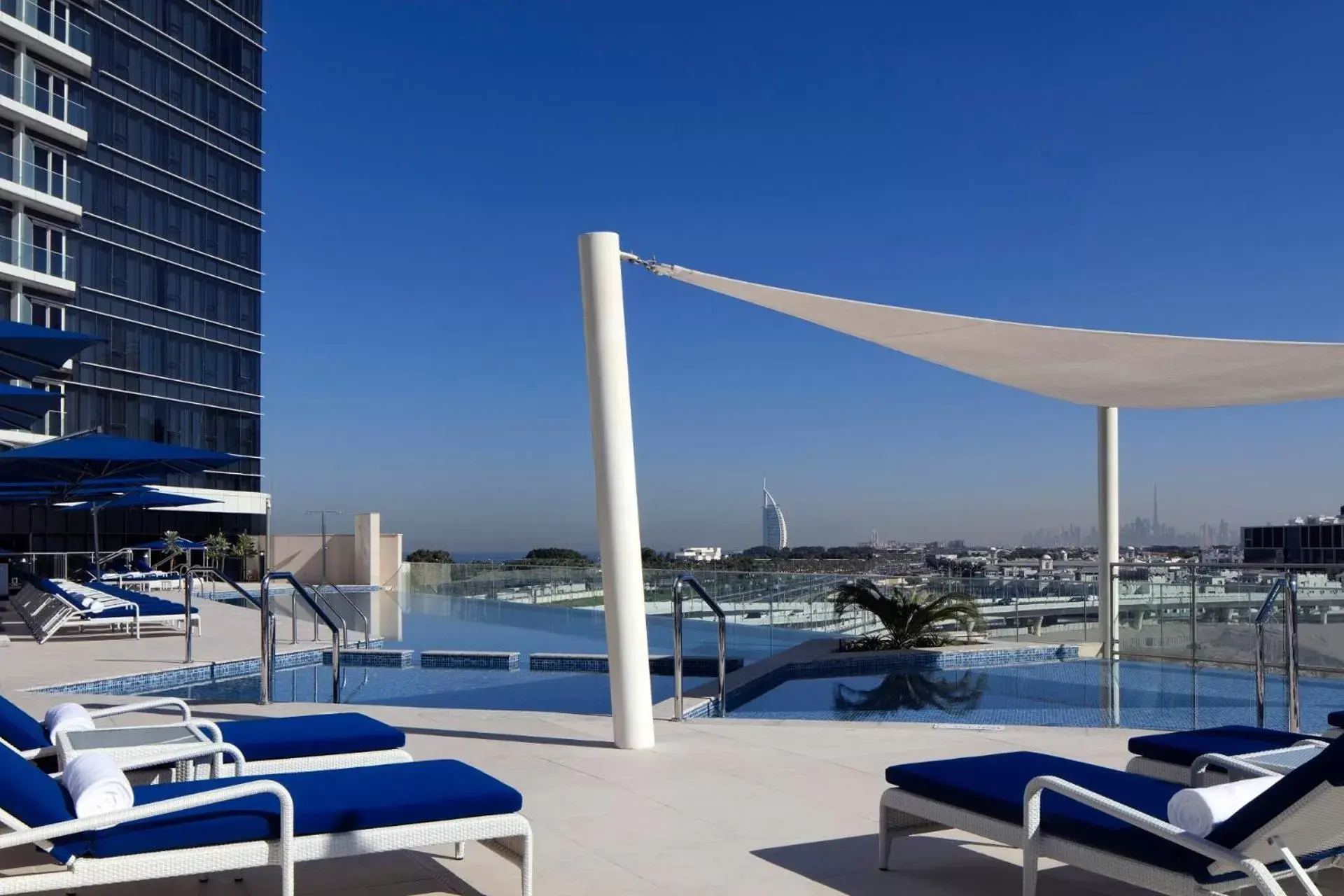 Swimming pool in Avani Plus Palm View Dubai Hotel & Suites