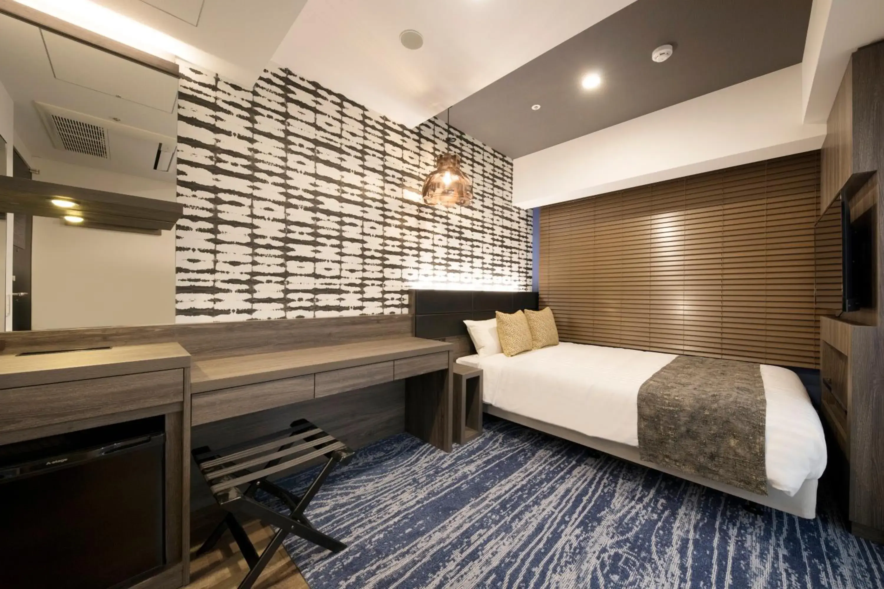 Photo of the whole room, Bed in Quintessa Hotel Sapporo Susukino