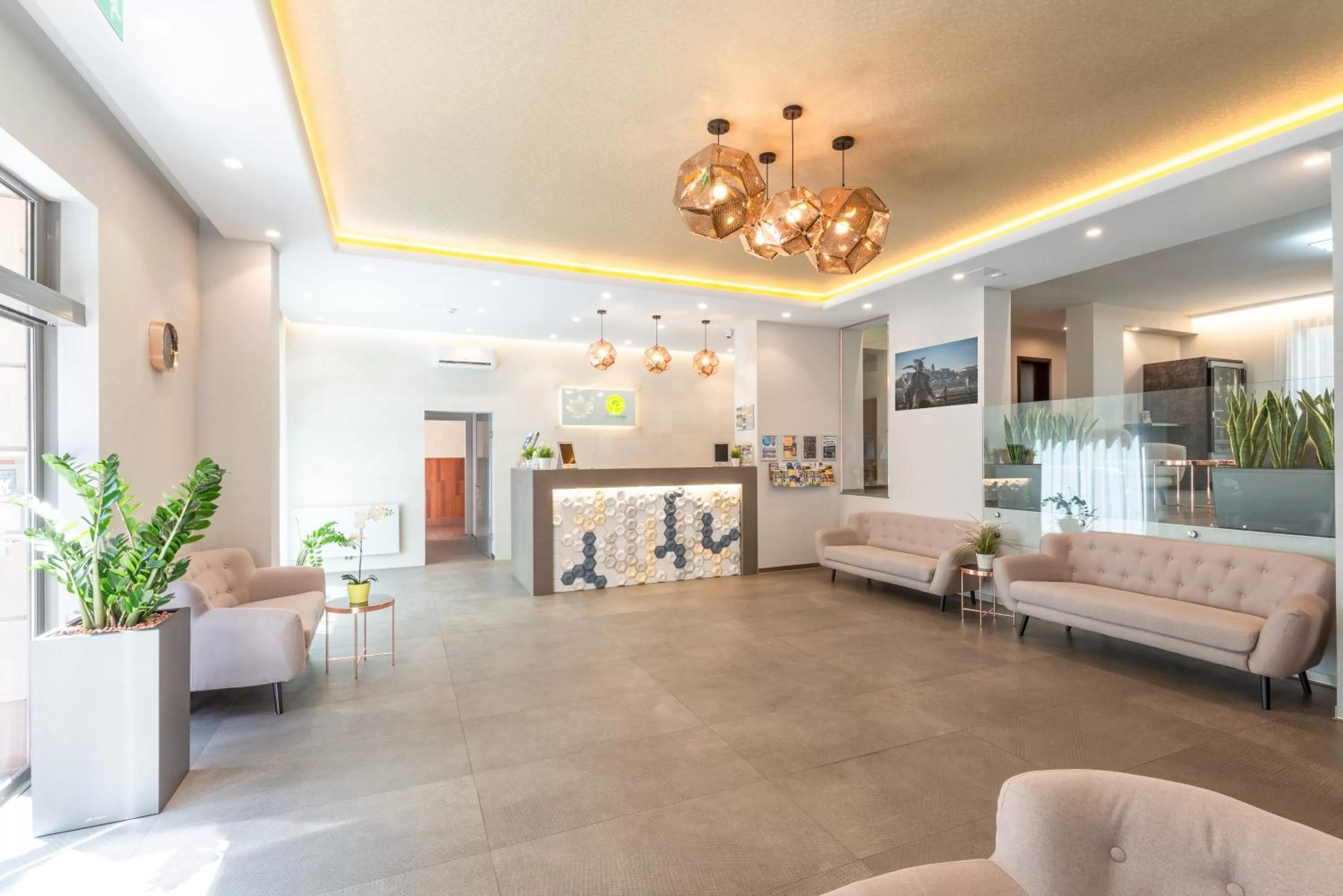 Lobby or reception in Corvin Plaza Apartments & Suites