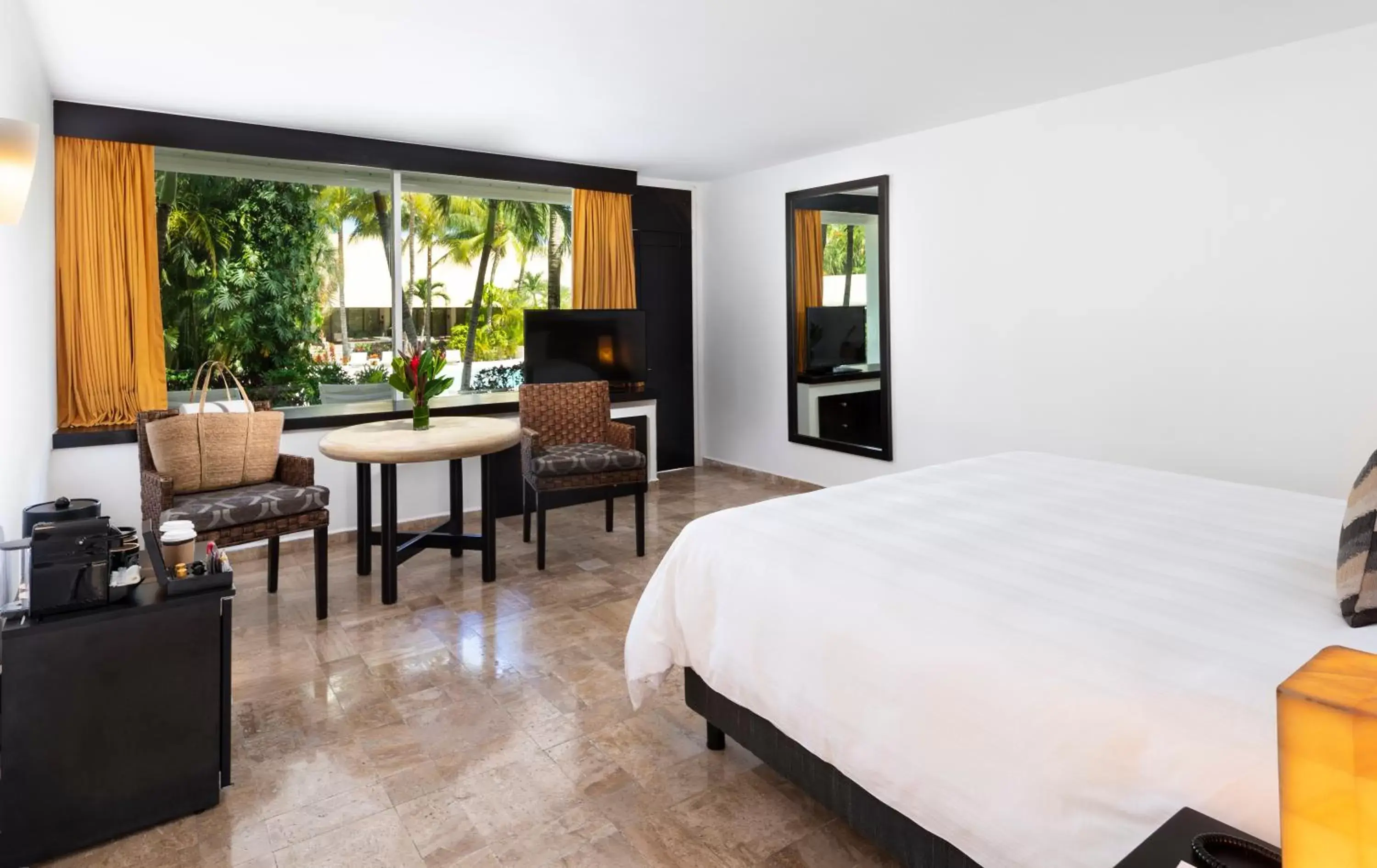 Bed in Presidente InterContinental Cozumel Resort & Spa, an IHG Hotel