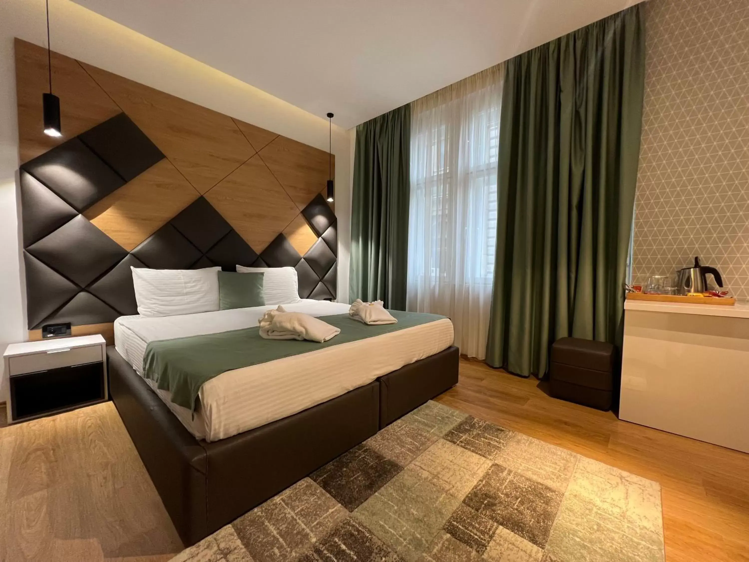 Bed in Capital Hotel Garni