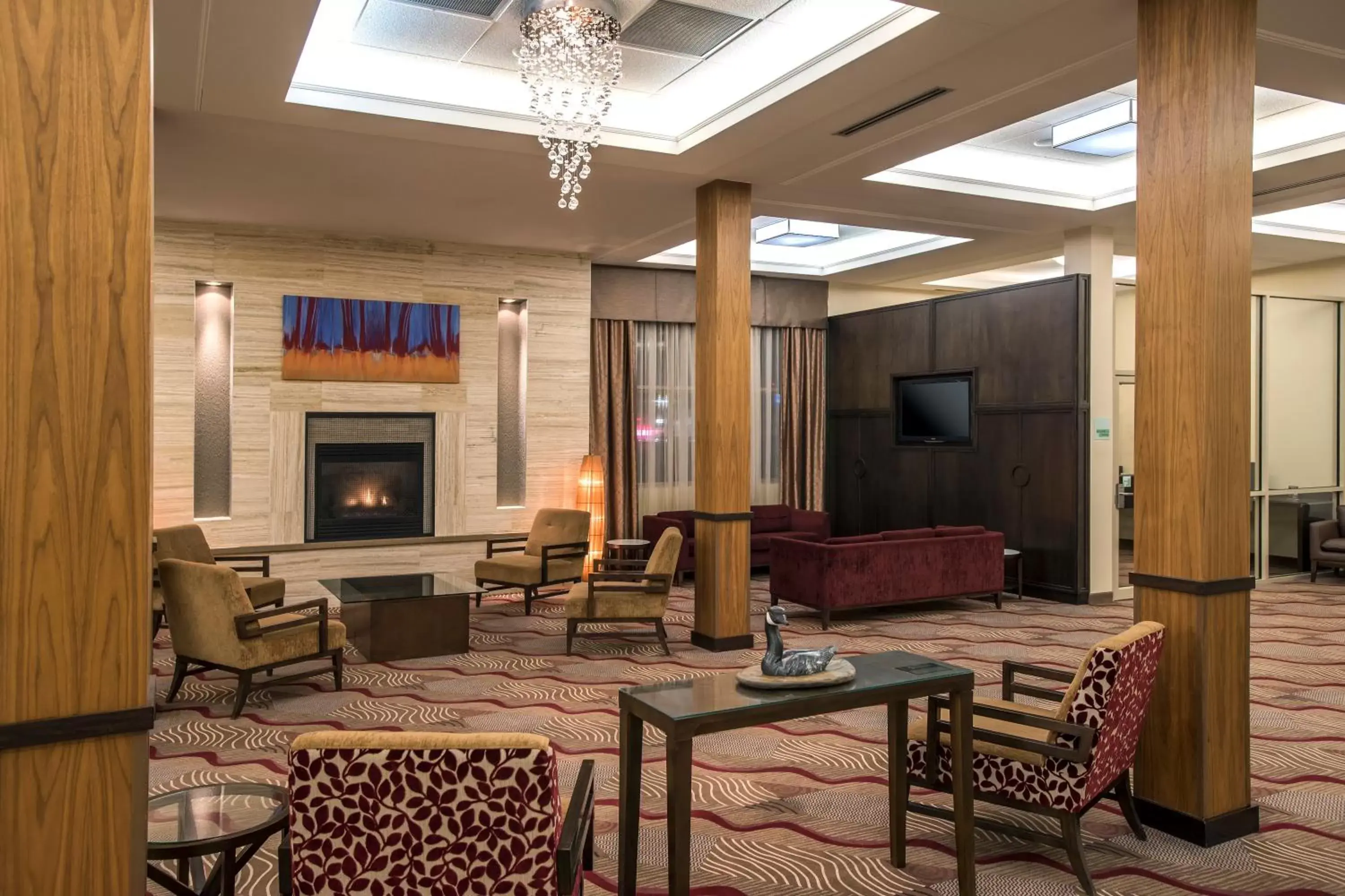 Lobby or reception, Seating Area in Holiday Inn Lethbridge, an IHG Hotel