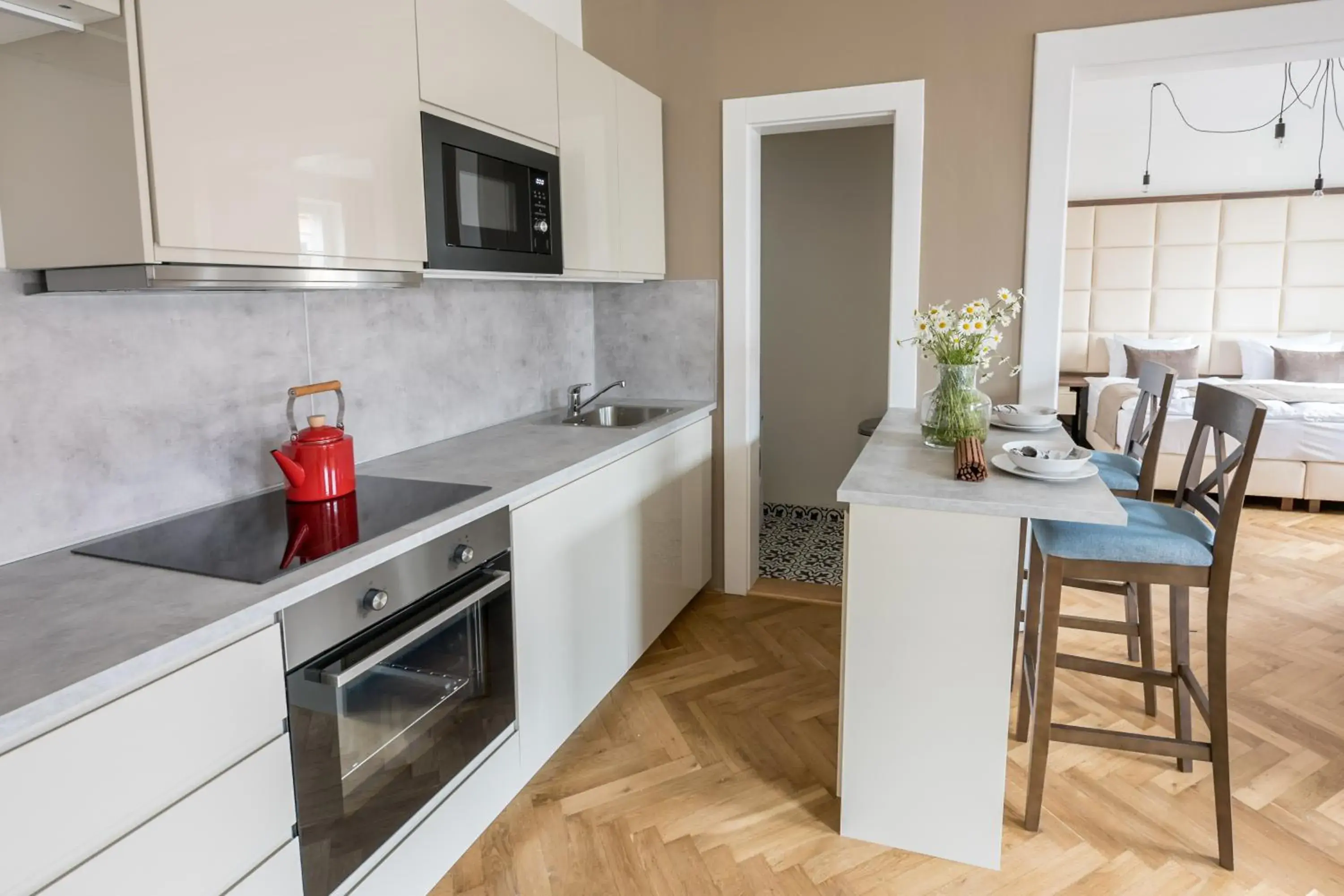 Kitchen/Kitchenette in Letna Garden Suites