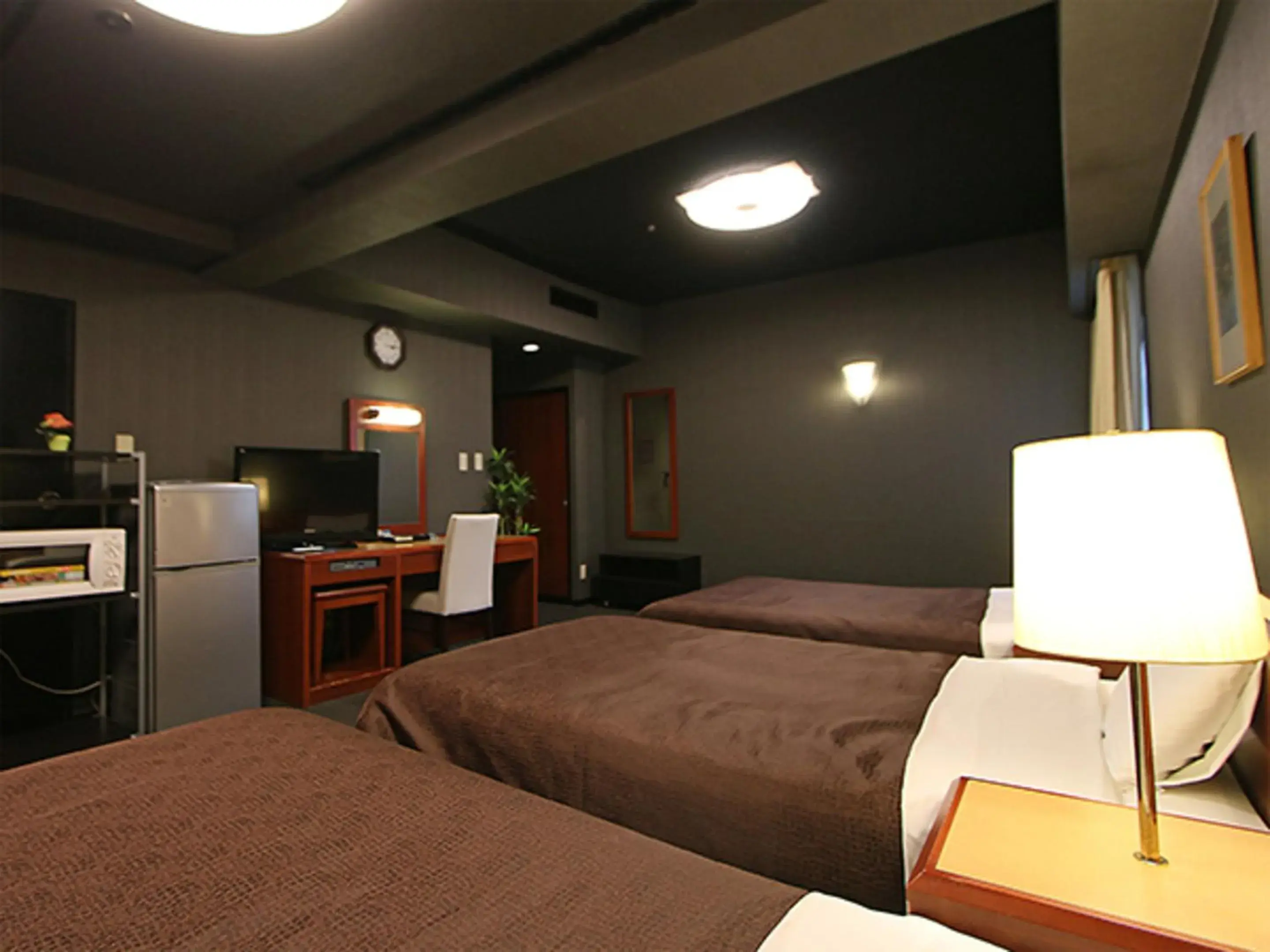 Bed in HOTEL LiVEMAX BUDGET Yokohama Tsurumi