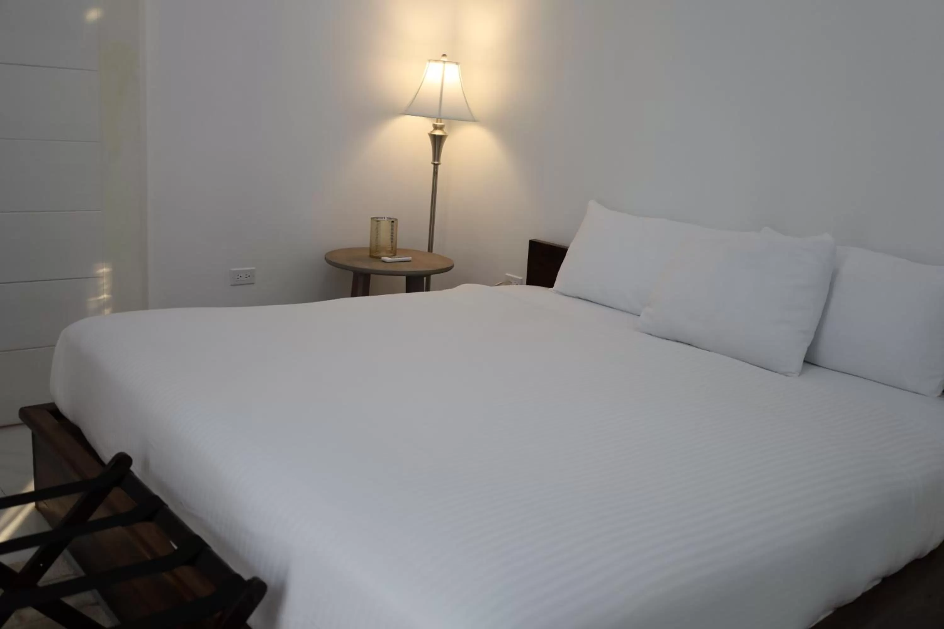 Bed in The Ellysian Boutique Hotel