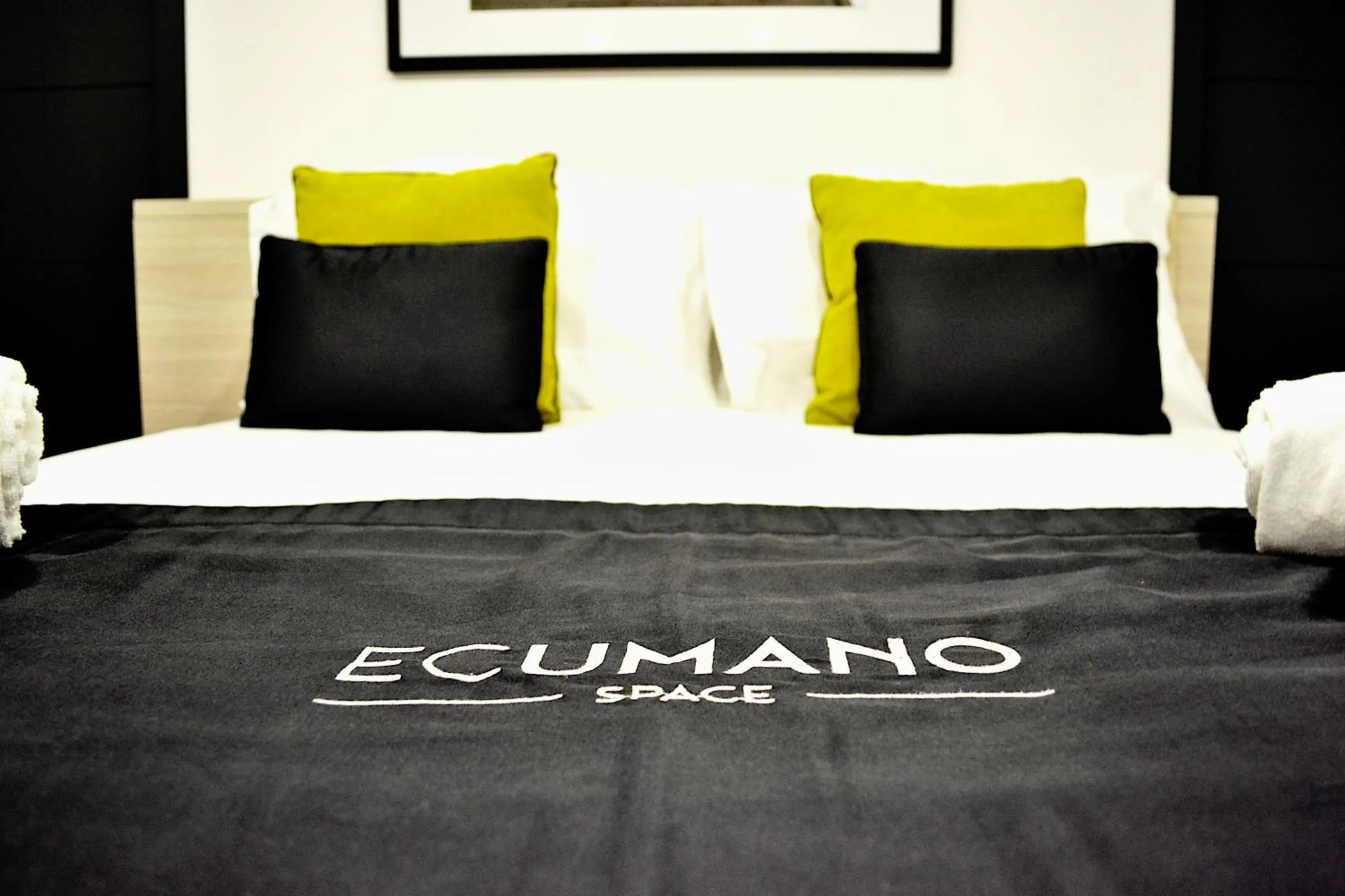 Bed in Ecumano Space