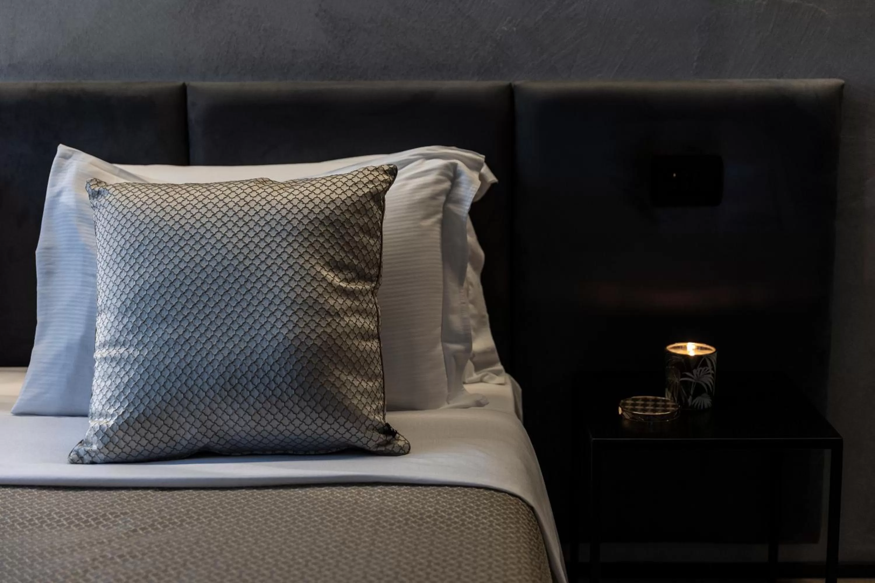 Bed in Corso 84 Luxury Suites